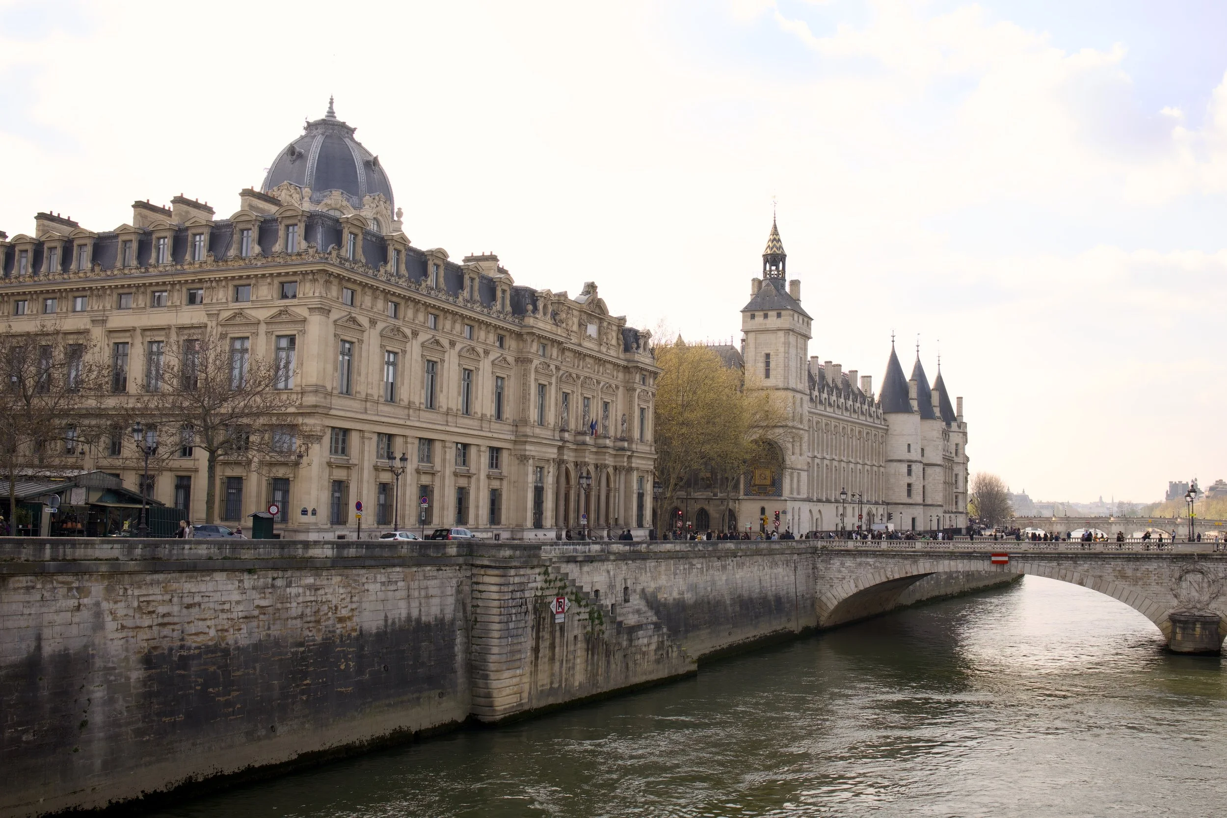Lifestyle and fashion photography with model at La Conciergerie, historic Paris landmark
