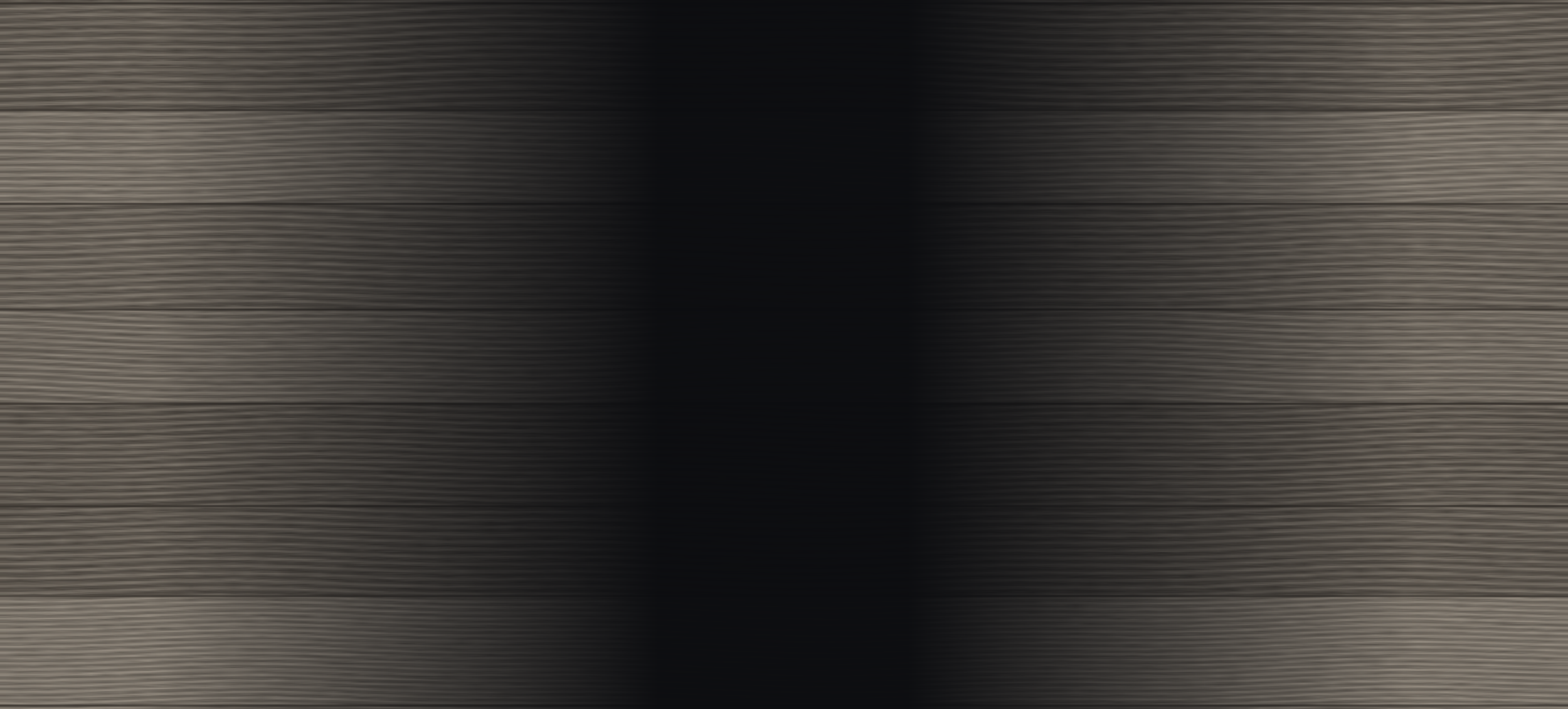 Close-up of horizontally textured surface with a shadow in the center.