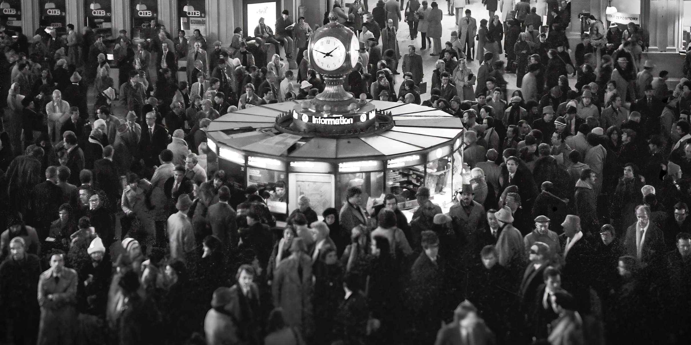 A crowded train station concourse with many people walking and standing. In the center is a large round information booth or kiosk with a clock on top showing 7:09. The scene is in black and white.