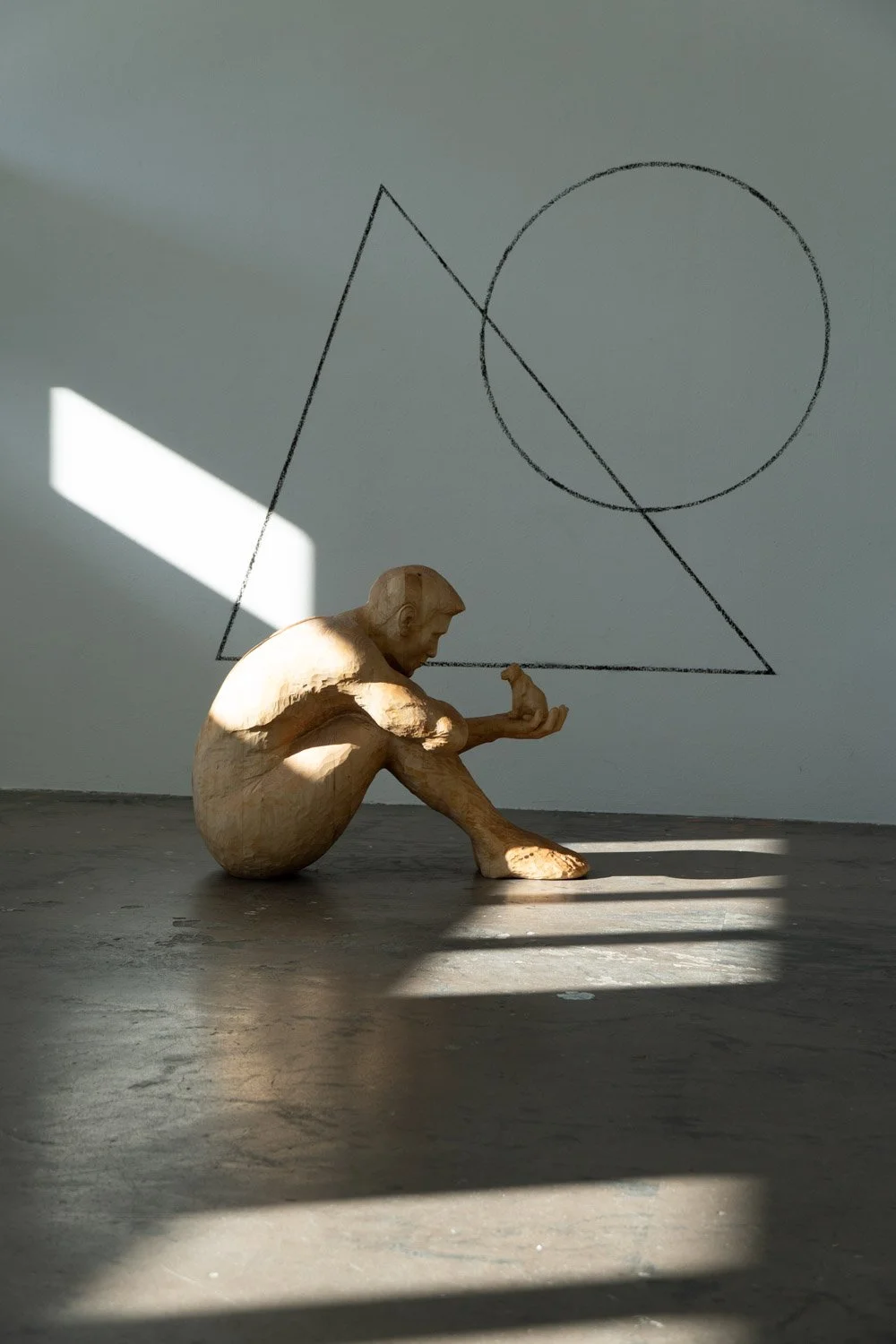 Einblick (Insight), 2023. Wood and charcoal — 80x90x56cm (dimensions without wall drawing)