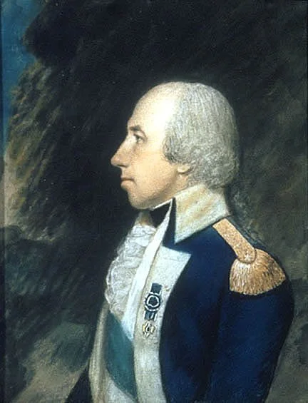 Portrait of Benjamin Franklin wearing a military uniform with medals, in profile view.