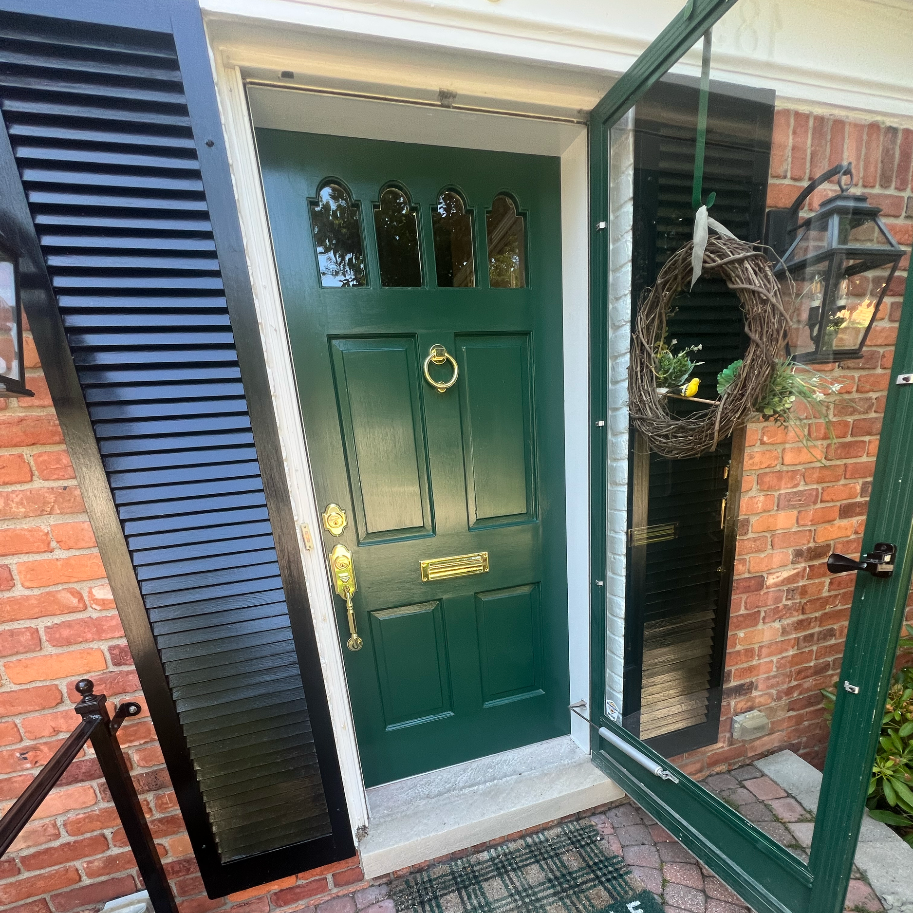 AFTER - Door and shutters were sanded, filled, caulked and primed and brought back to life. 