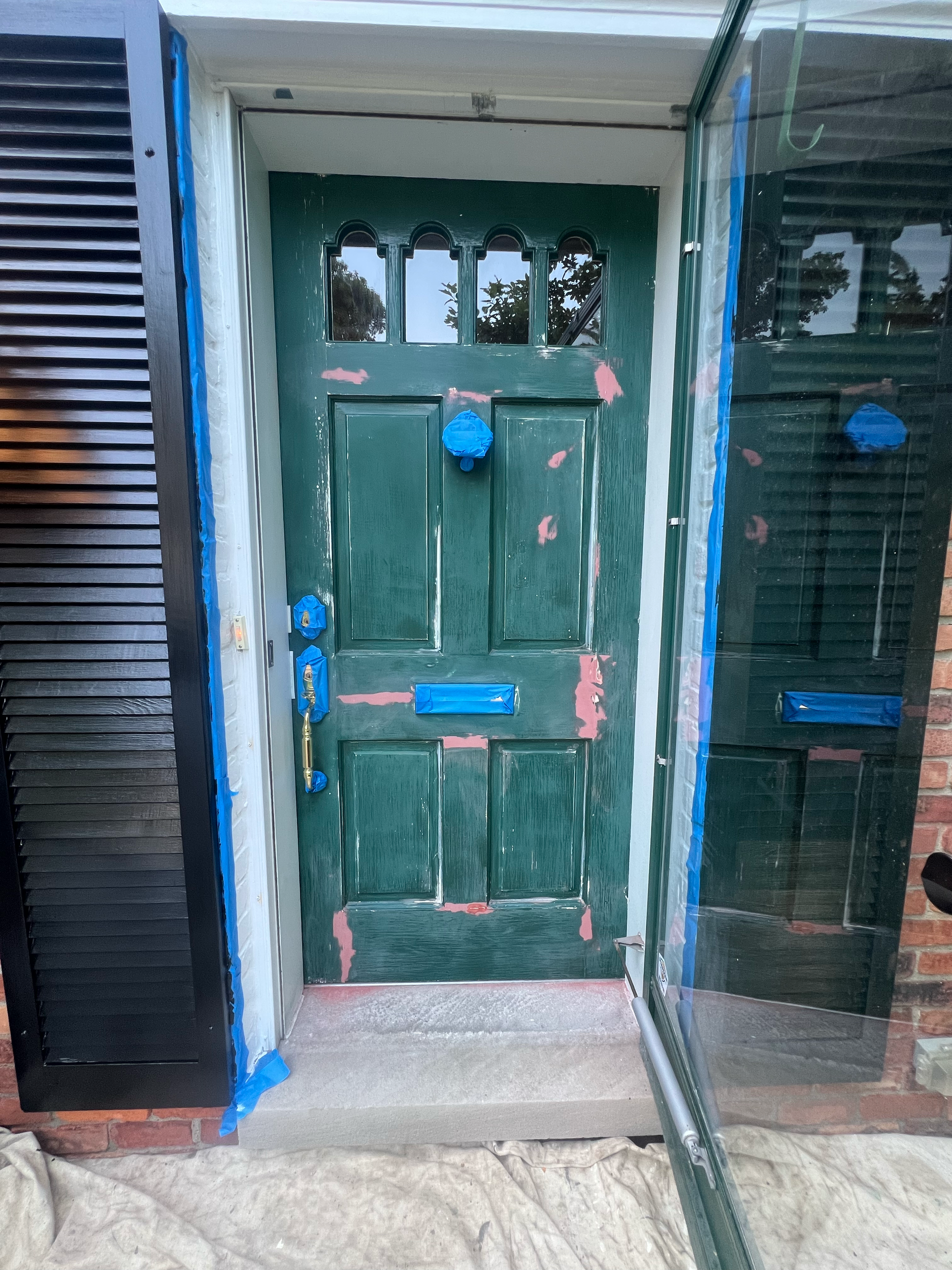 BEFORE - This southern-facing front entrance had taken a beating from the sun and elements over the years. Proper prep is key in these types of repairs.