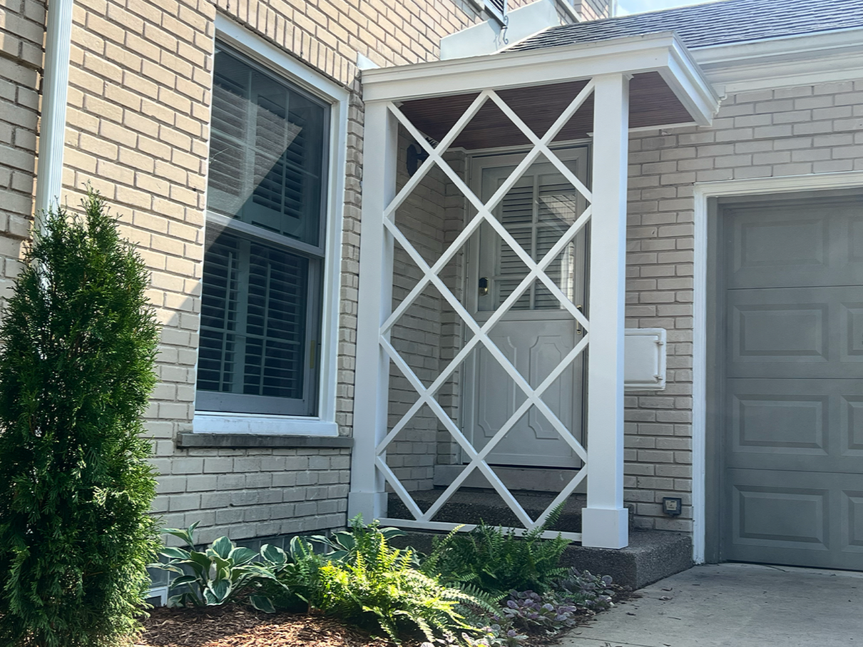 AFTER - New portico with beadboard ceiling and restored lattice