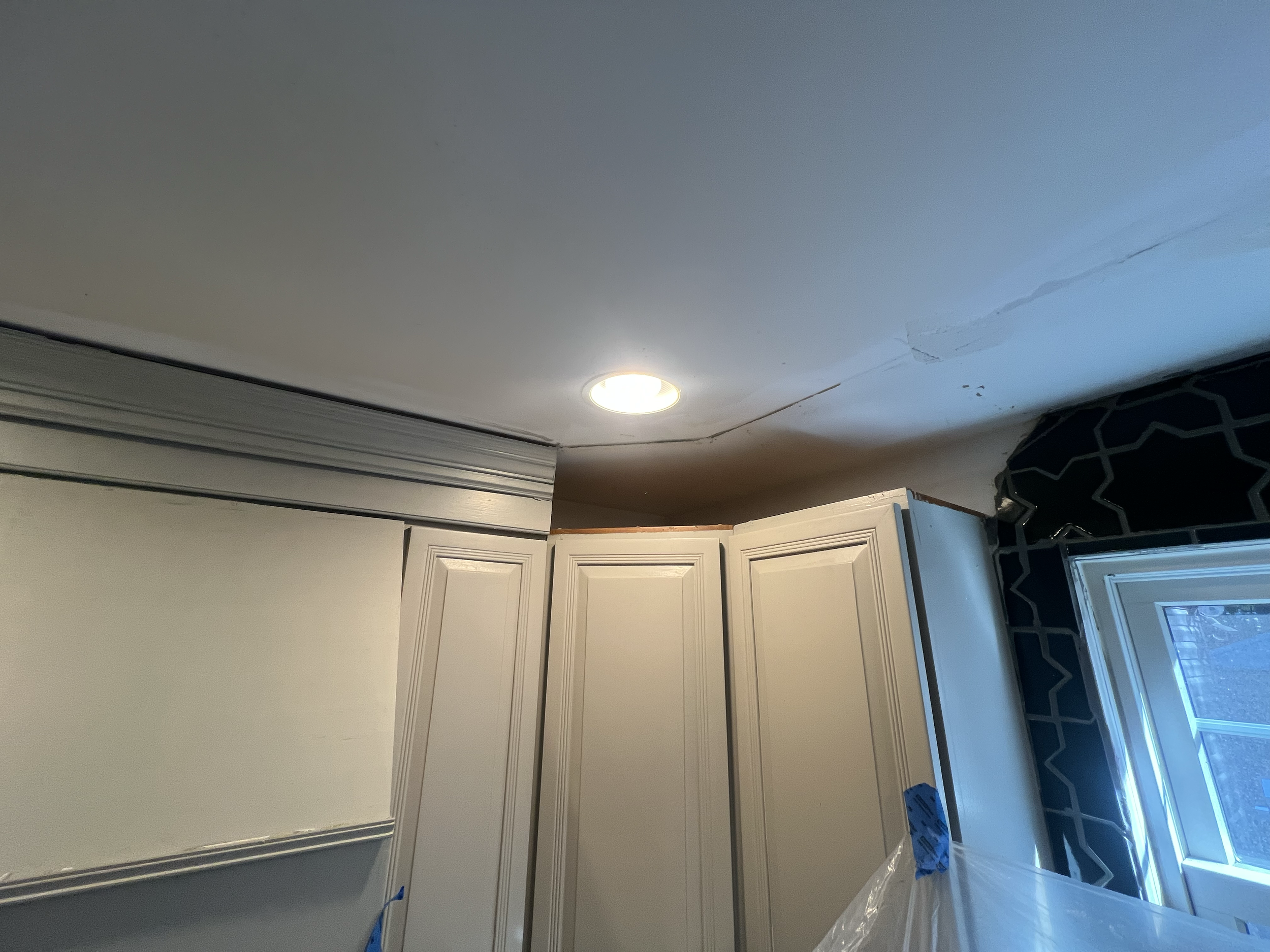 BEFORE - This kitchen had been missing the crown molding in several spots for years given the intricacy of the design and difficulty in replacing.