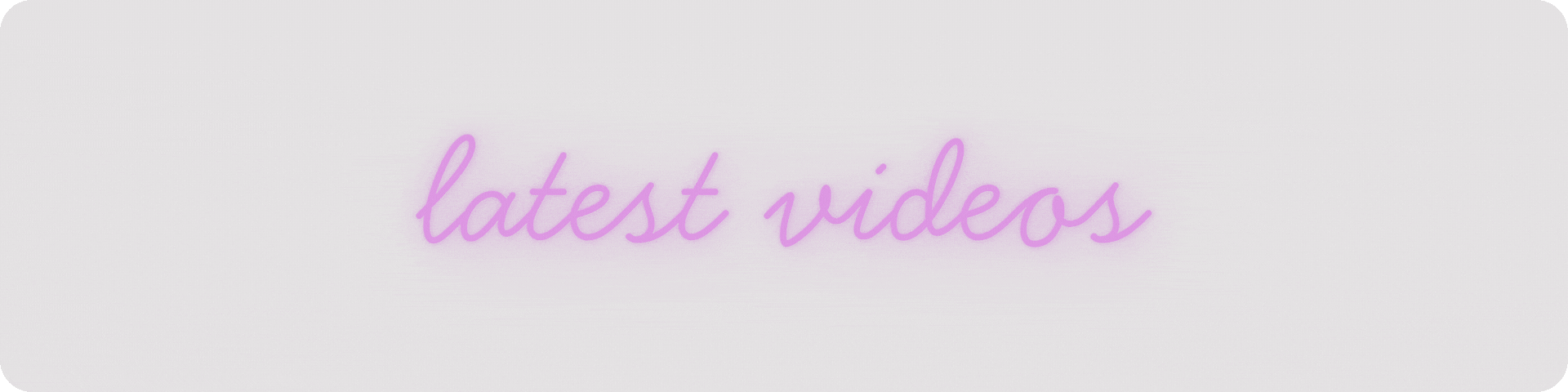 A pastel-colored graphic with the text 'latest videos' written in purple cursive font.