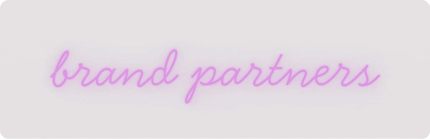 Neon purple cursive text that reads 'brand partners' on a light background.