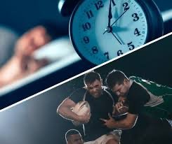 A close-up of a blue clock showing approximately 12:00, above a scene with two students looking at a phone in a classroom.