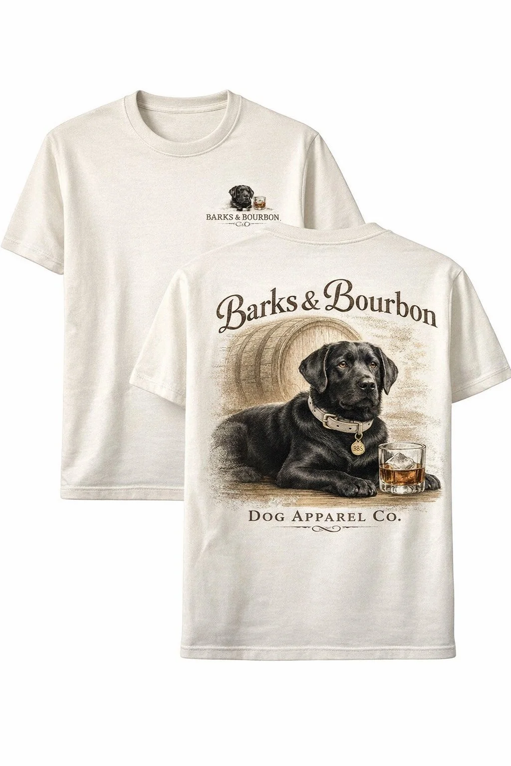 White t-shirts with dog-themed designs, featuring a black Labrador with a bourbon glass and a barrel in the background, and text reading 'Barks & Bourbon' and 'Dog Apparel Co.'