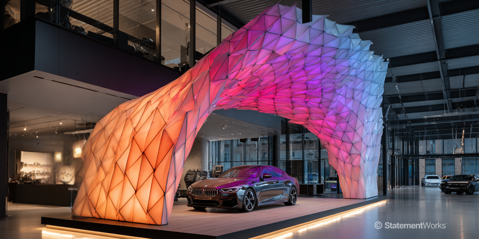 Car showroom with large illuminated sculptural arch over vehicle