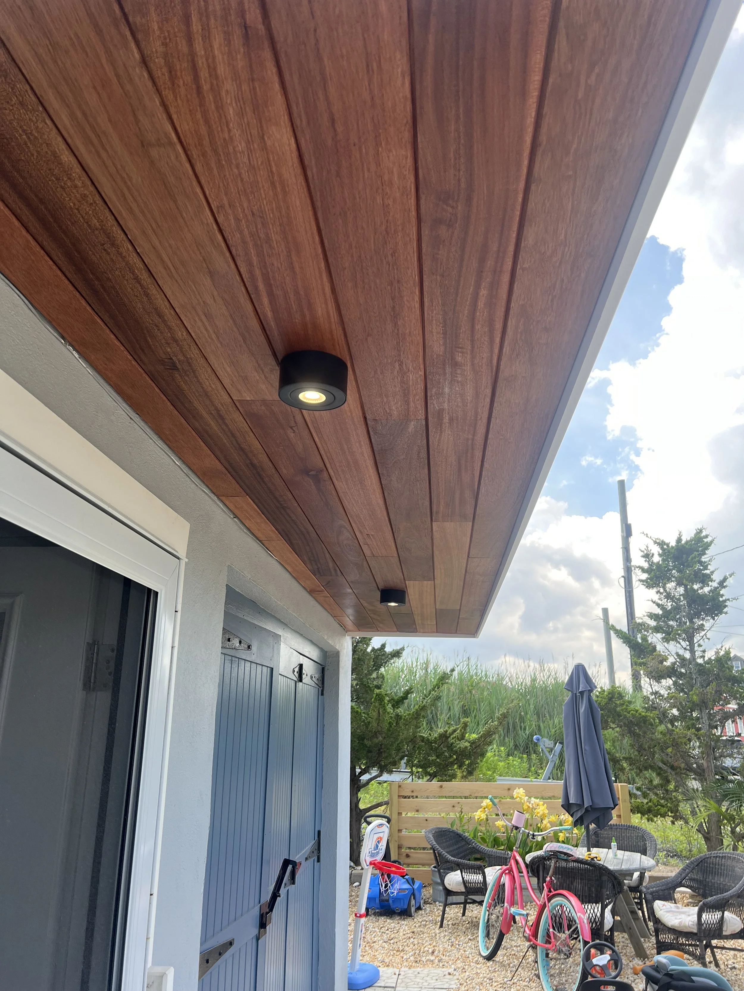 Mahogany soffit with new lights