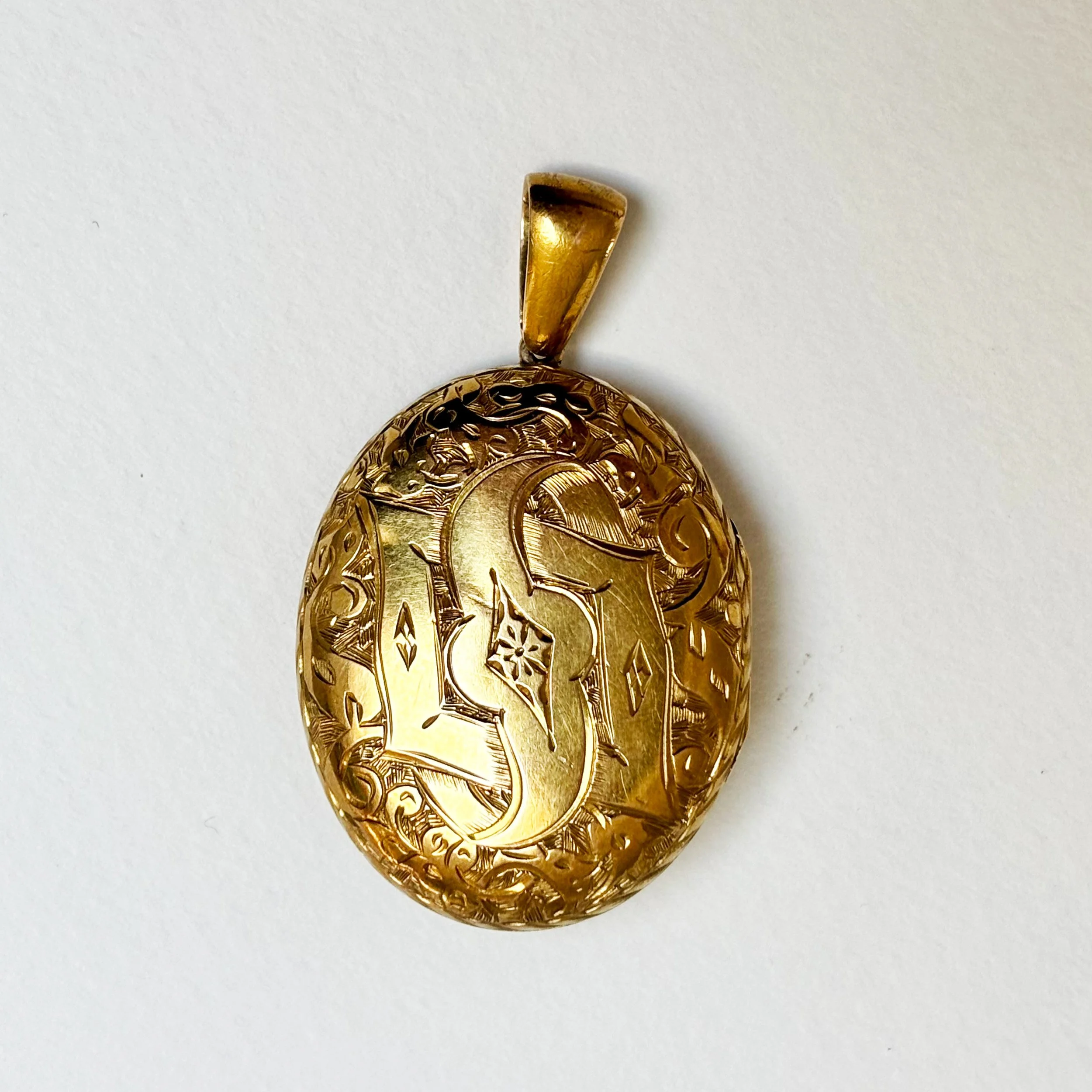 CRA011_starburst locket_7.jpg
