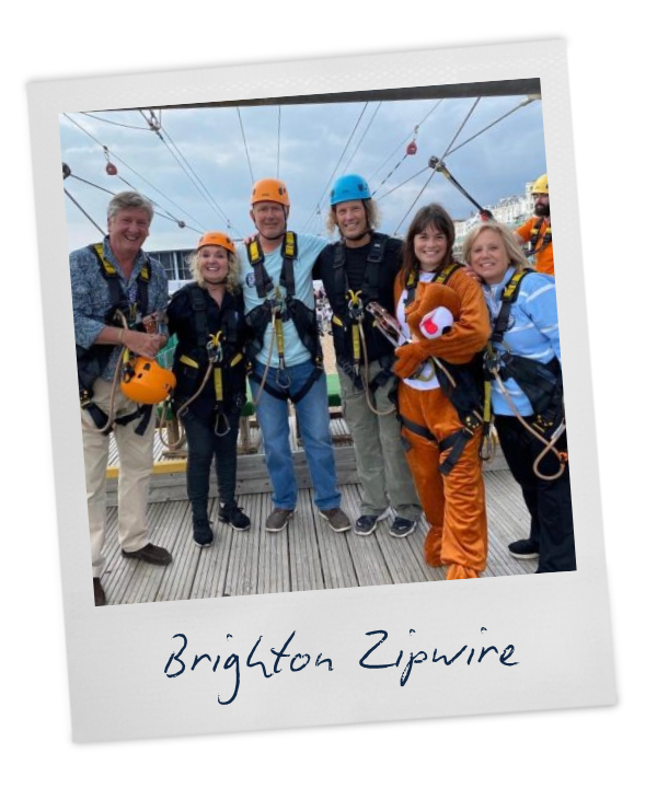 Group of six people prepares to do a zipwire