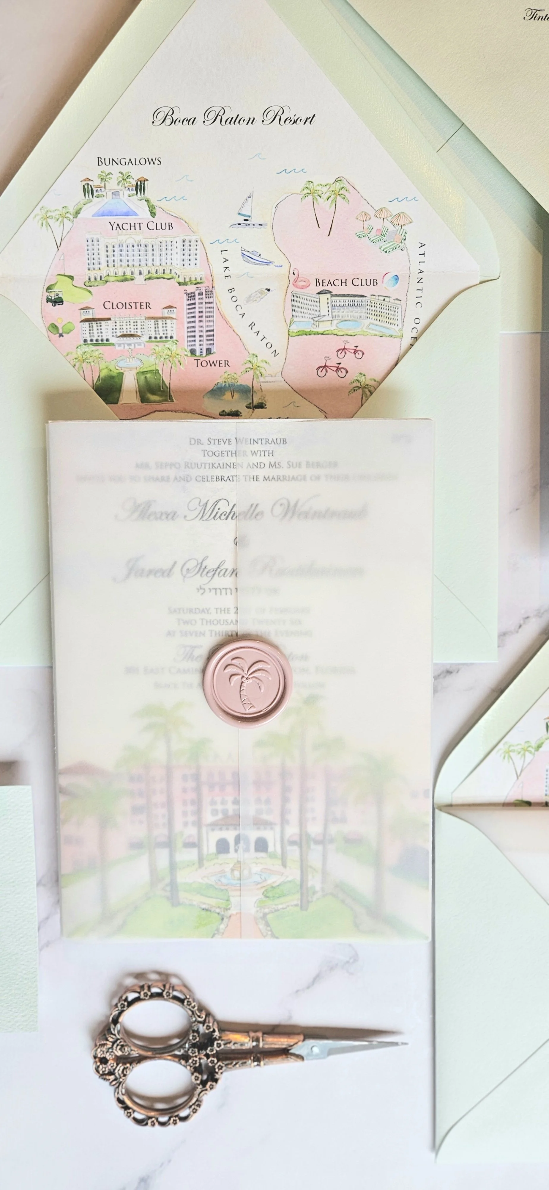 Invitation to a wedding at Boca Raton Resort with a map of the resort showing landmarks like the yacht club, beach club, towers, and bungalows, along with a pair of ornate scissors and a pink seal with a palm tree engraved on it.