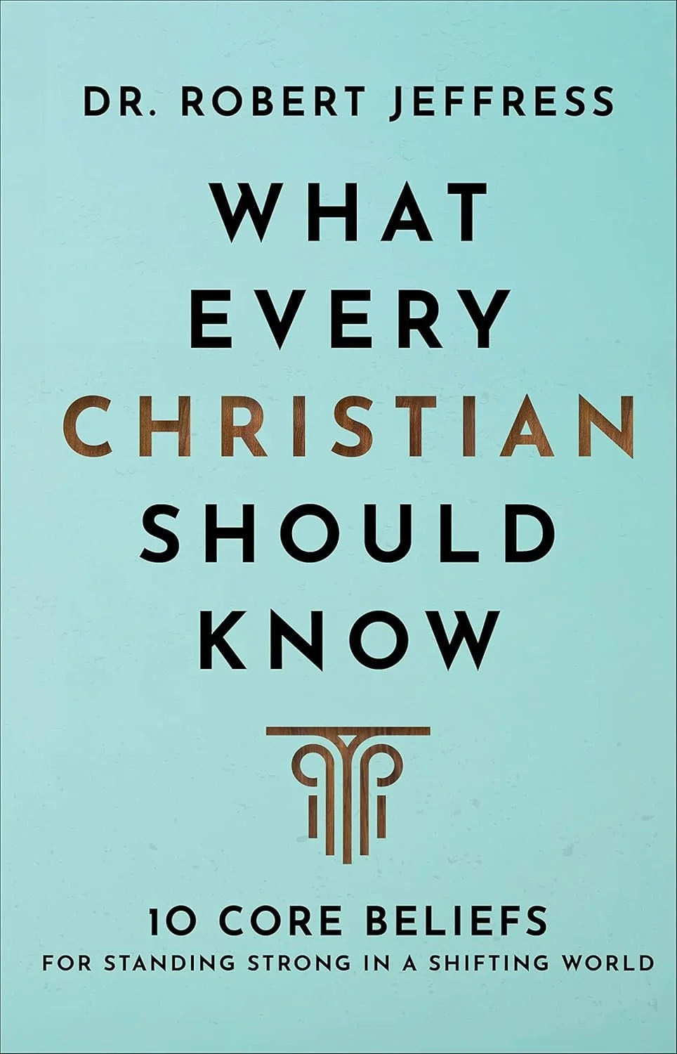 Book cover titled 'What Every Christian Should Know' by Dr. Robert Jeffress, with subtitle '10 Core Beliefs for Standing Strong in a Shifting World,' featuring a blue background and stylized decorative element.