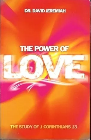 Book cover titled "The Power of Love" by Dr. David Jeremiah, with a vibrant orange, purple, and pink background.