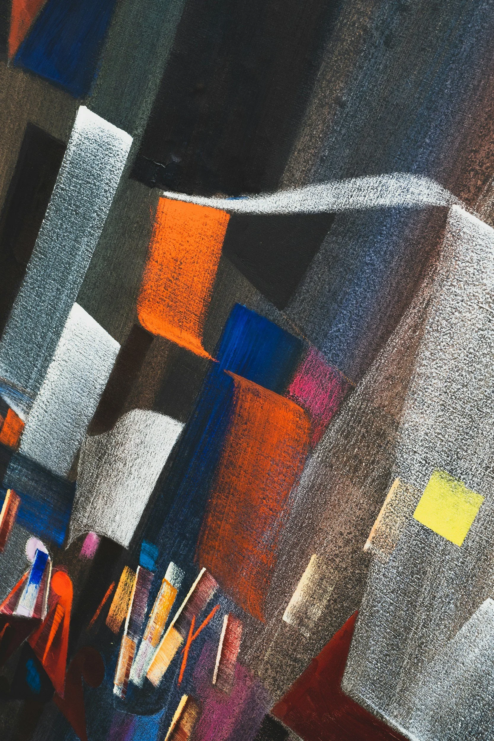 Close-up of a colorful, abstract geometric painting with various rectangles and squares in colors including black, white, orange, blue, pink, yellow, and red.