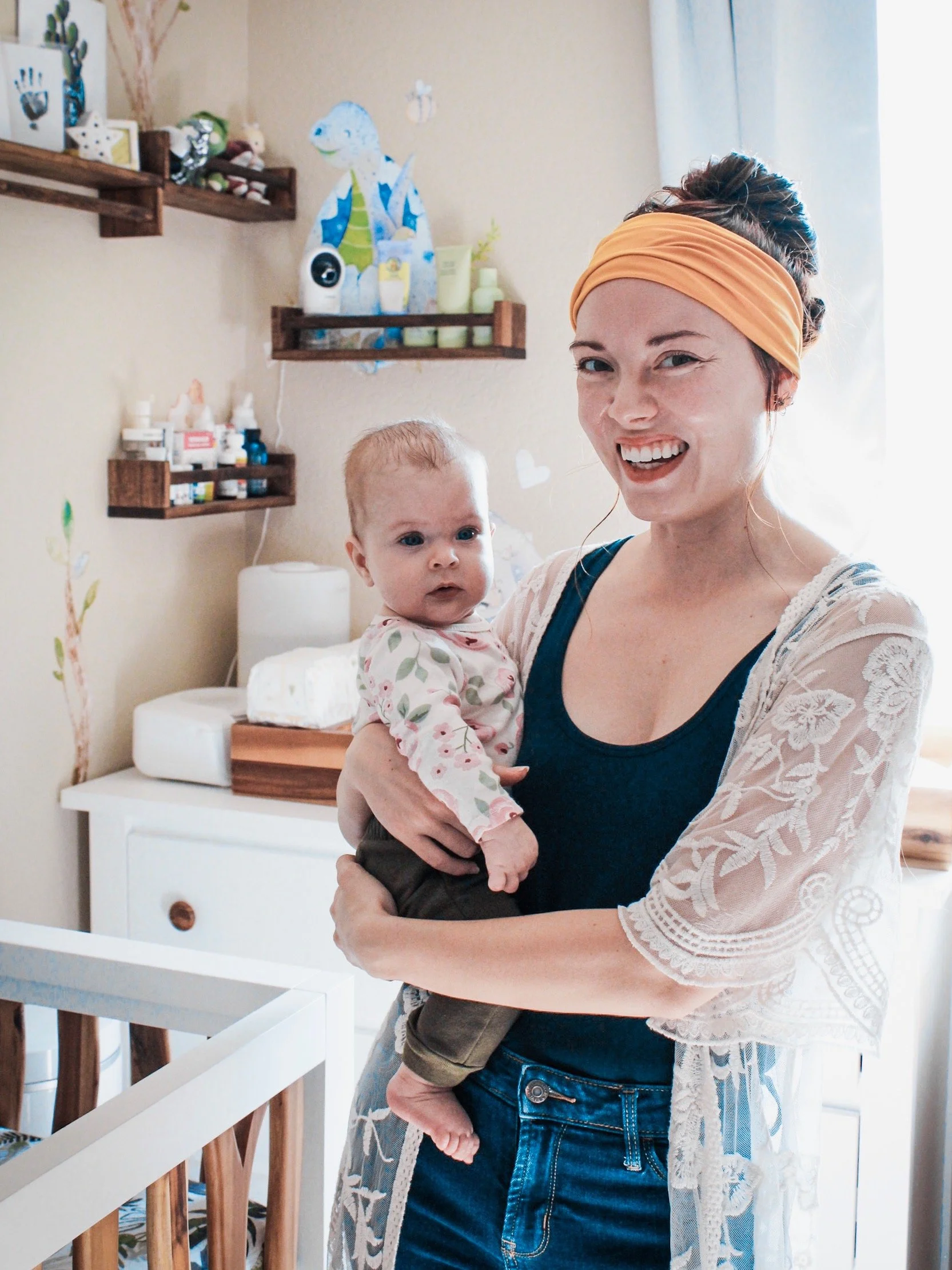 nurse and postpartum doula hannah holding baby