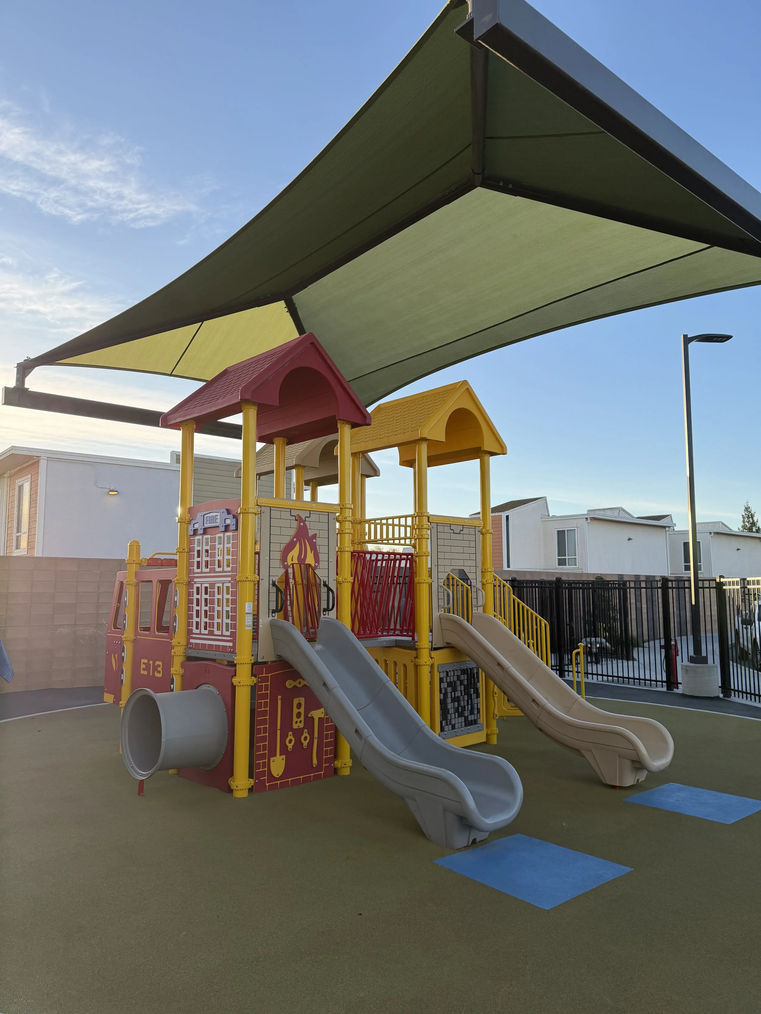 Red and Yellow Playground for Pre-School Children shaped like a firestation