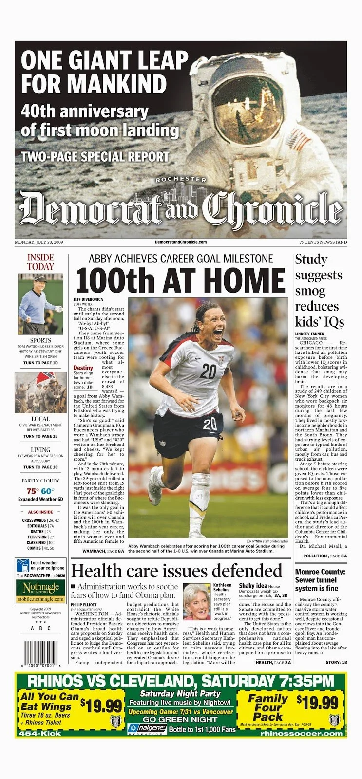 Front page of the 'Democrat and Chronicle' newspaper, featuring a historic photograph of the Apollo 11 astronaut in space suit and helmet, celebrating the 40th anniversary of the moon landing, with headlines about Abby Achieves Career Milestone, Heal