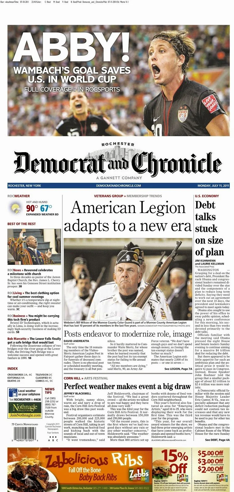 Front page of the Rochester Democrat and Chronicle newspaper, dated Monday, July 11, 2011. The main headline is about Abby Wambach's goal saving the U.S. in the World Cup. The page features photos of Abby Wambach celebrating and a veteran group membe