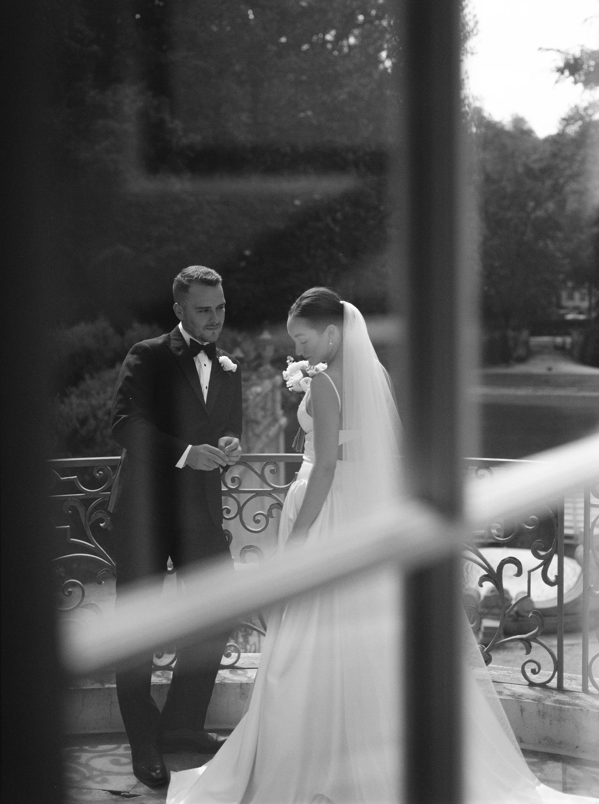 Bride and groom portrait at Swan House Atlanta with historic estate architecture and romantic garden setting 