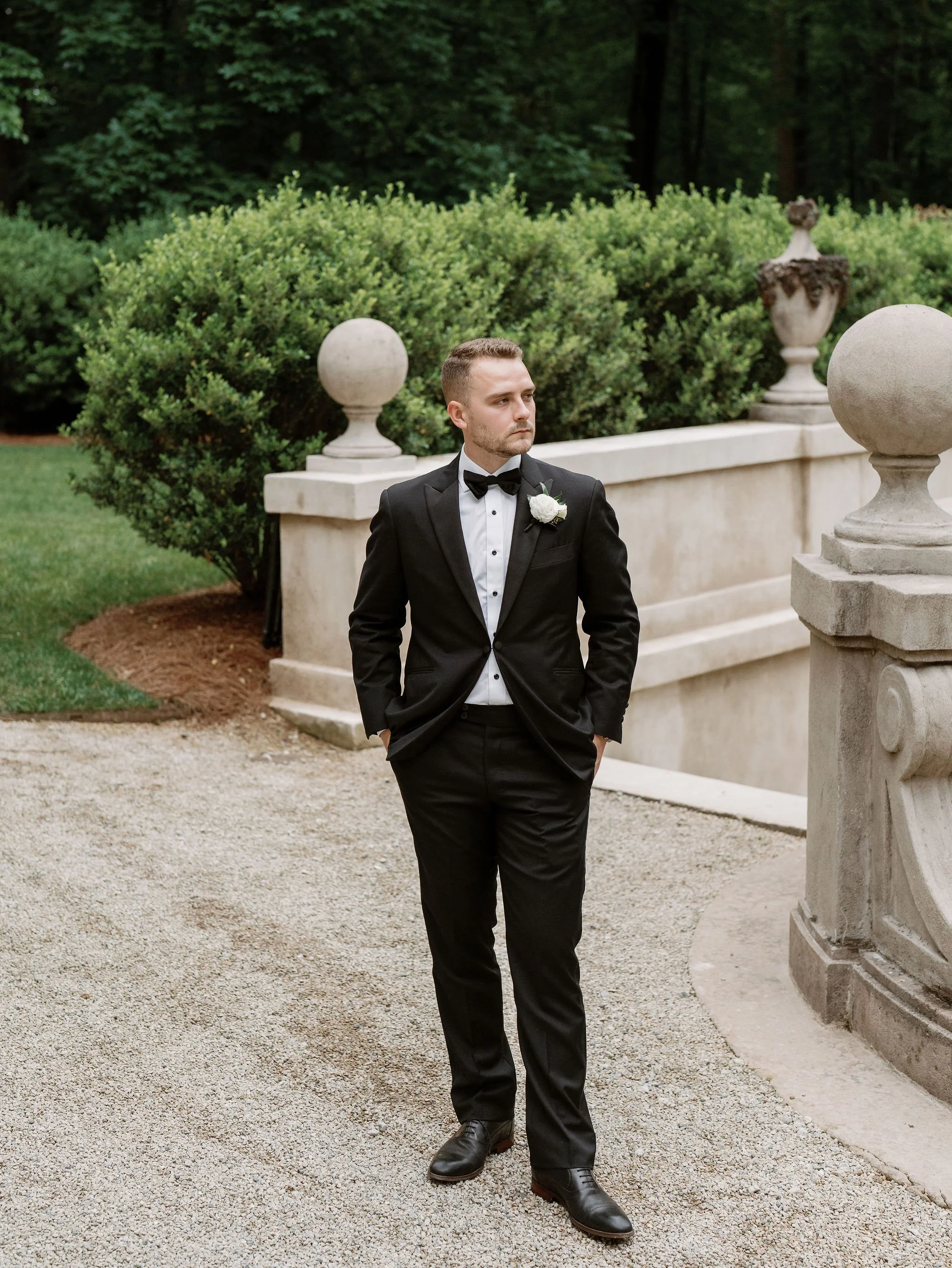 groom portrait at Swan House Atlanta with historic estate architecture and romantic garden setting 