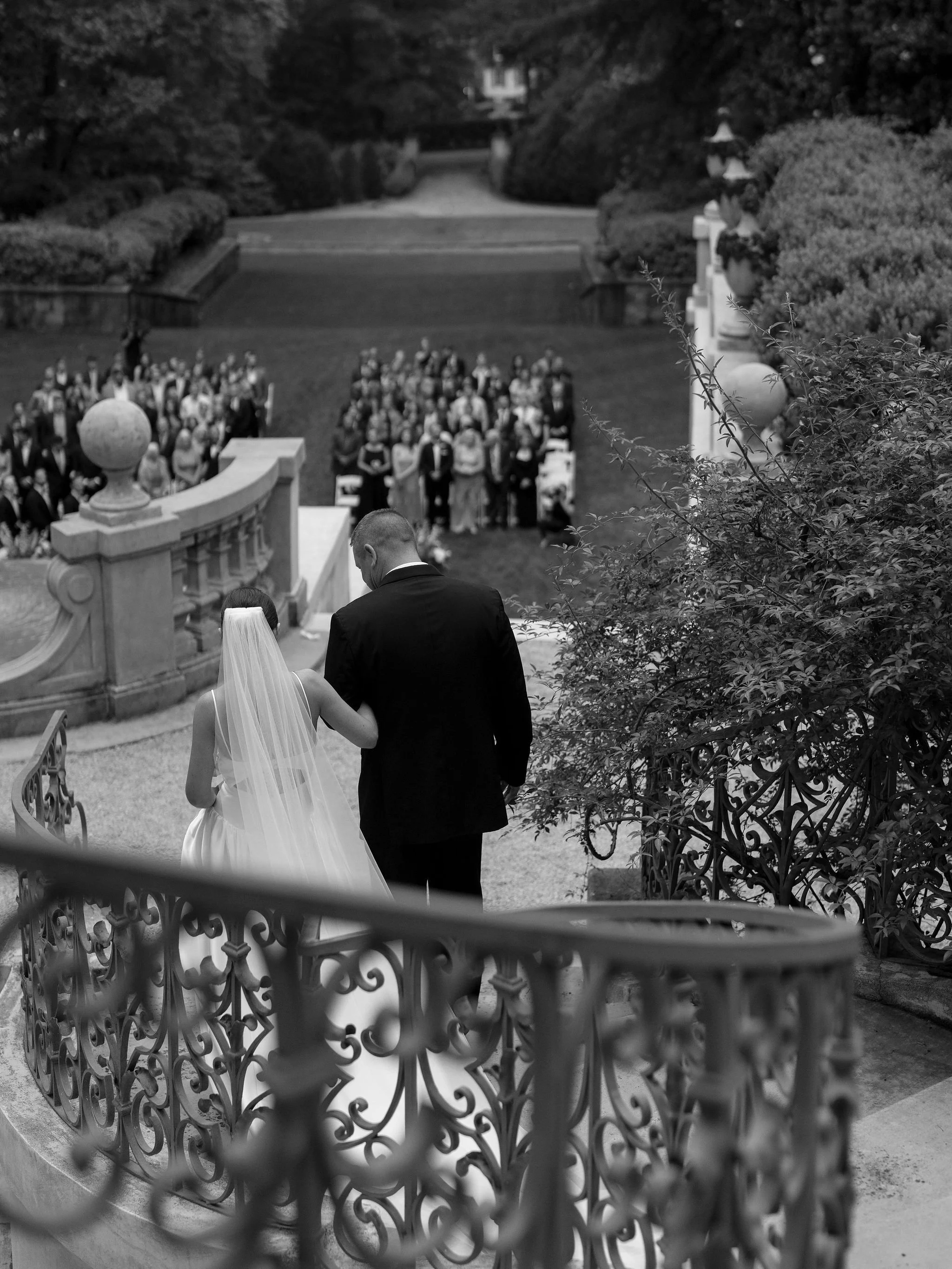 Outdoor wedding ceremony at Swan House Atlanta History Center with elegant garden and estate backdrop