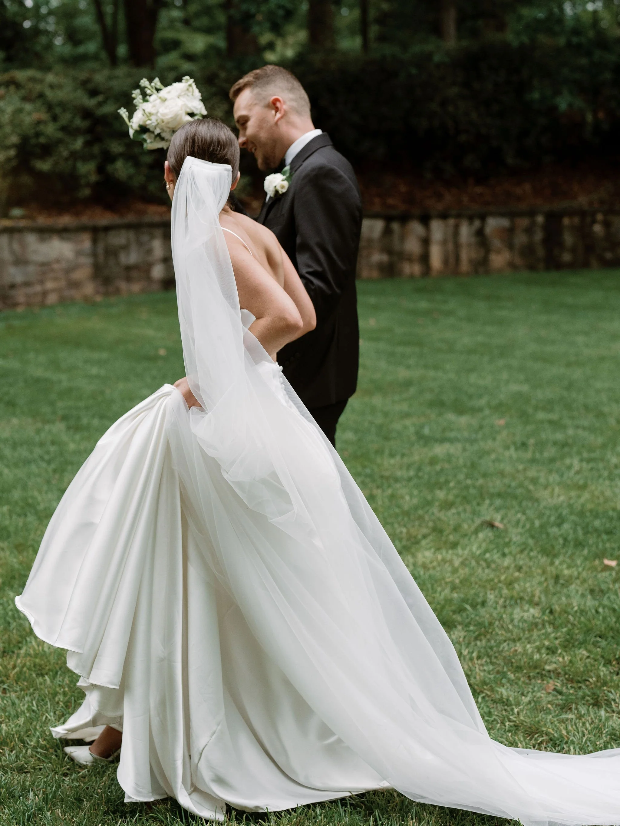Outdoor wedding ceremony at Swan House Atlanta History Center with elegant garden and estate backdrop