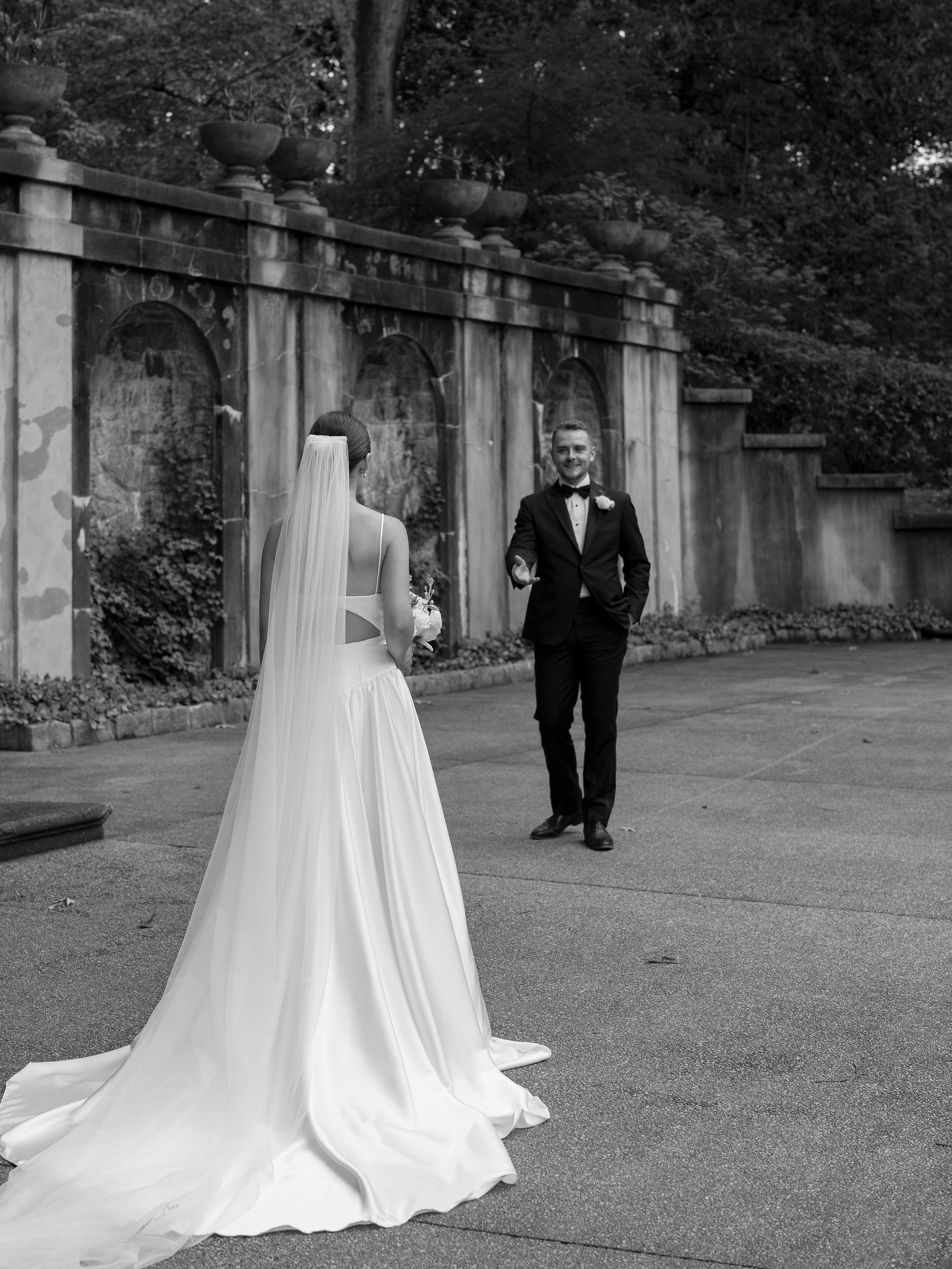 Bride and groom portrait at Swan House Atlanta with historic estate architecture and romantic garden setting 
