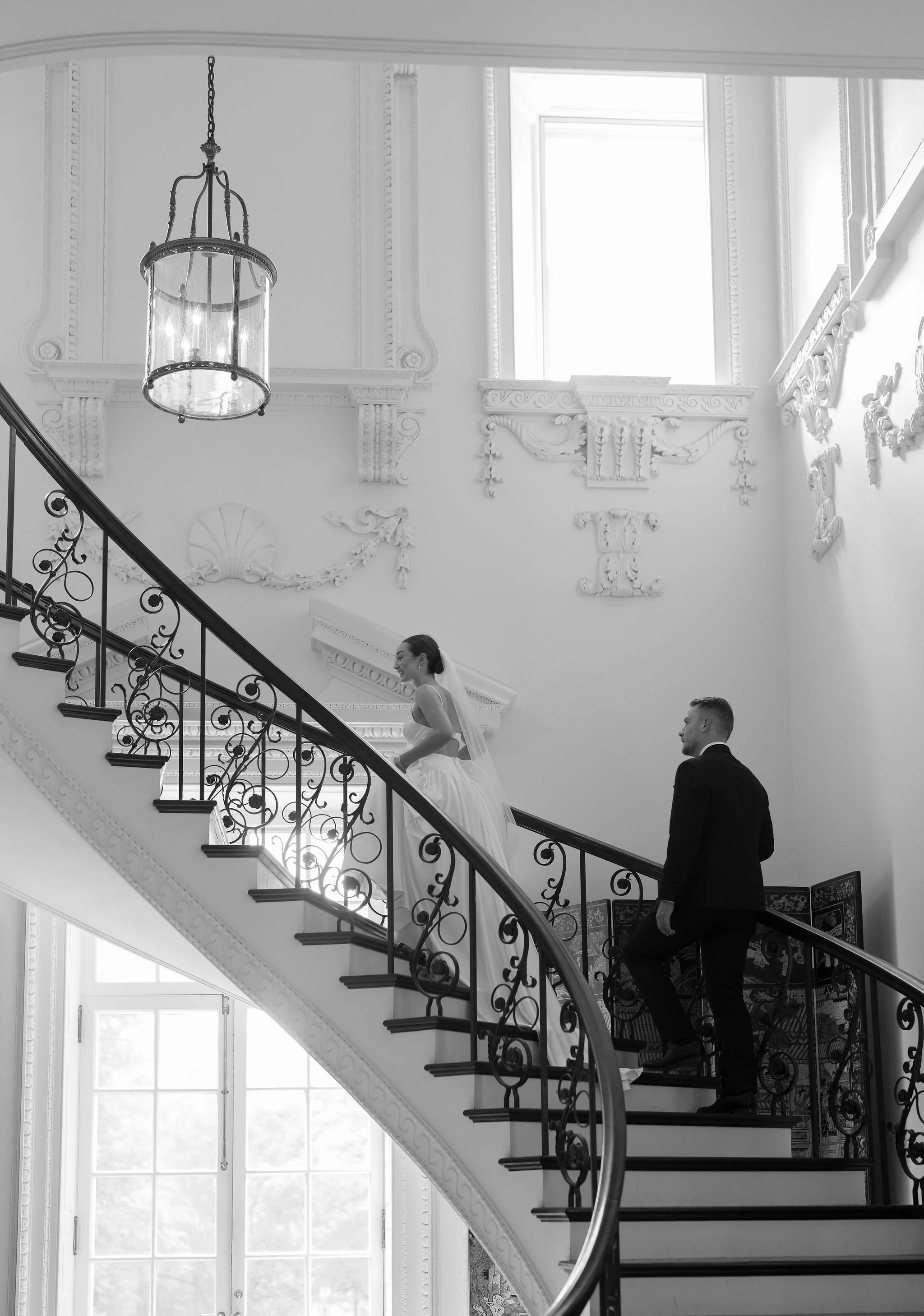 Bride and groom portrait at Swan House Atlanta with historic estate architecture and romantic garden setting 