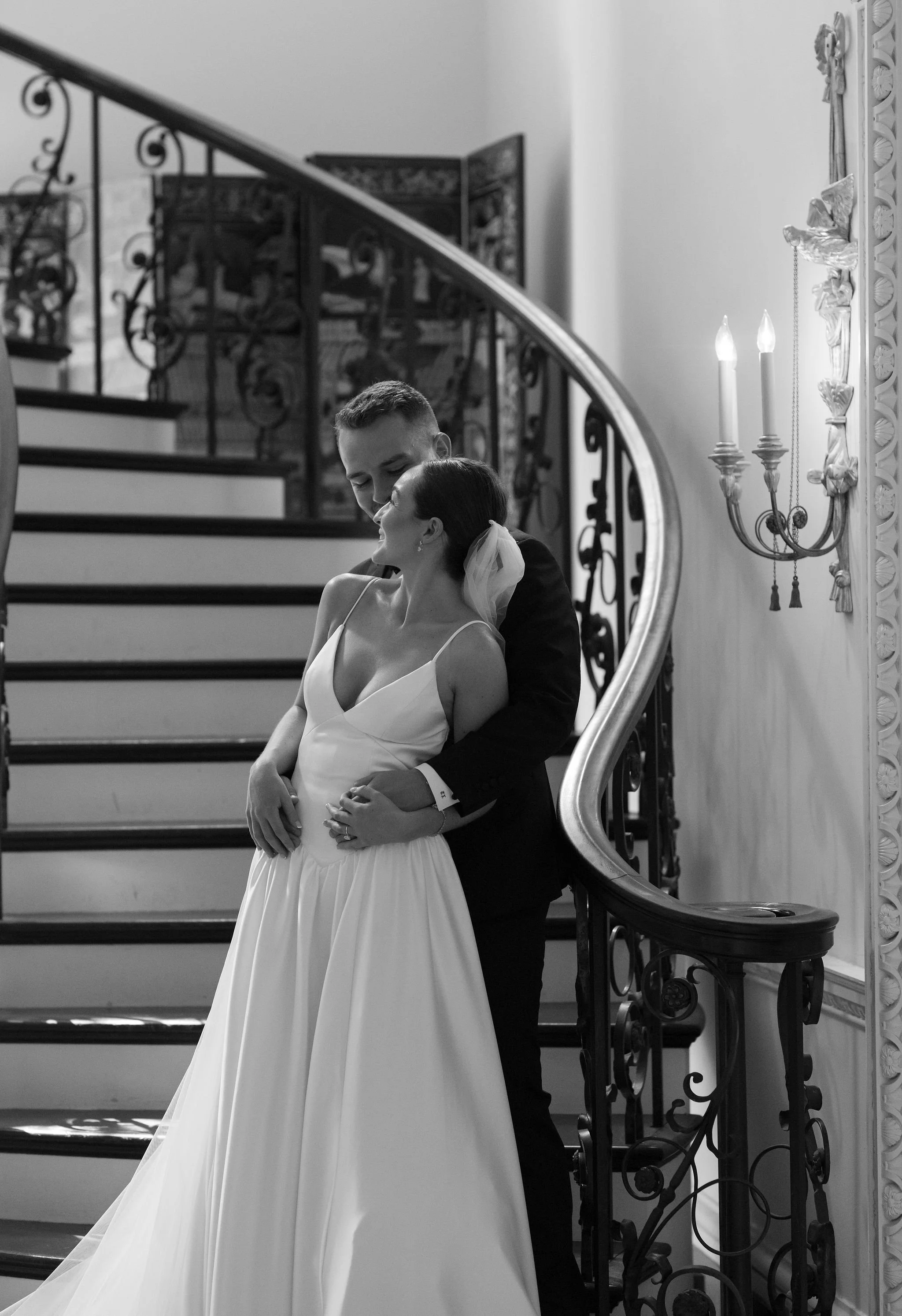 Bride and groom portrait at Swan House Atlanta with historic estate architecture and romantic garden setting 