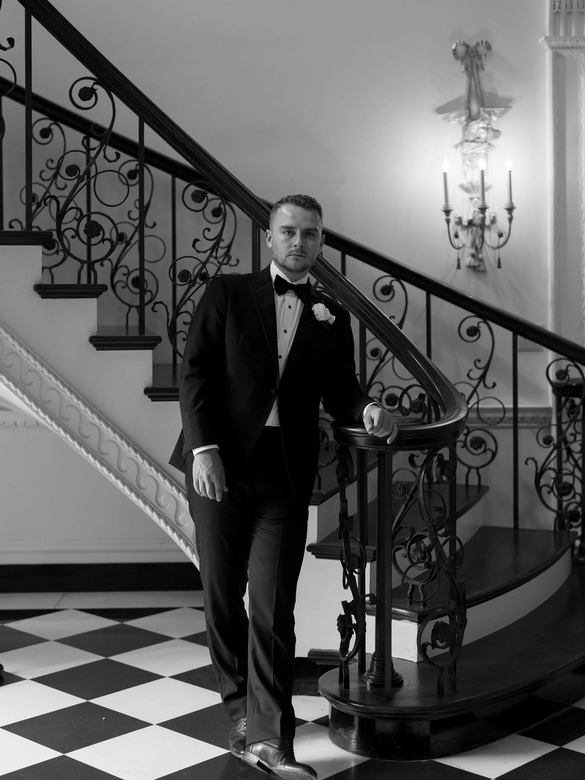 Bride and groom portrait at Swan House Atlanta with historic estate architecture and romantic garden setting 