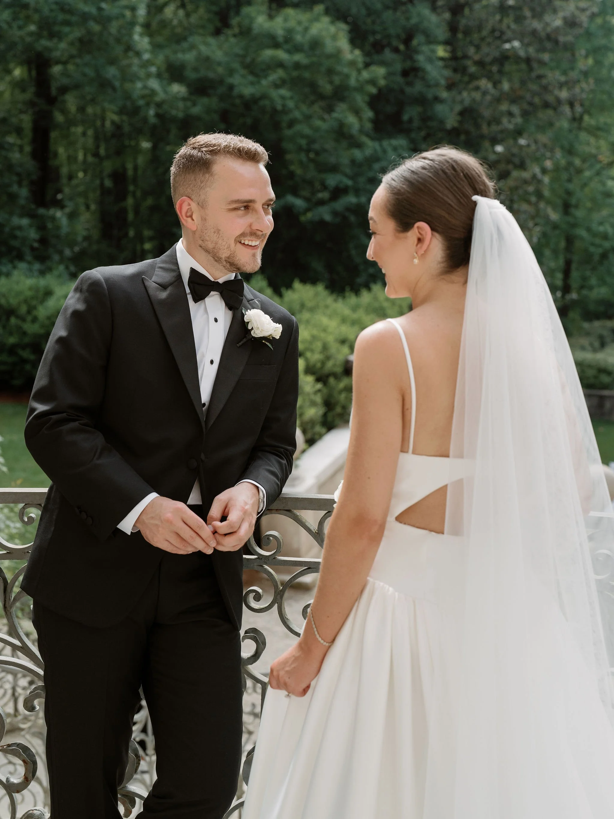 Bride and groom portrait at Swan House Atlanta with historic estate architecture and romantic garden setting 