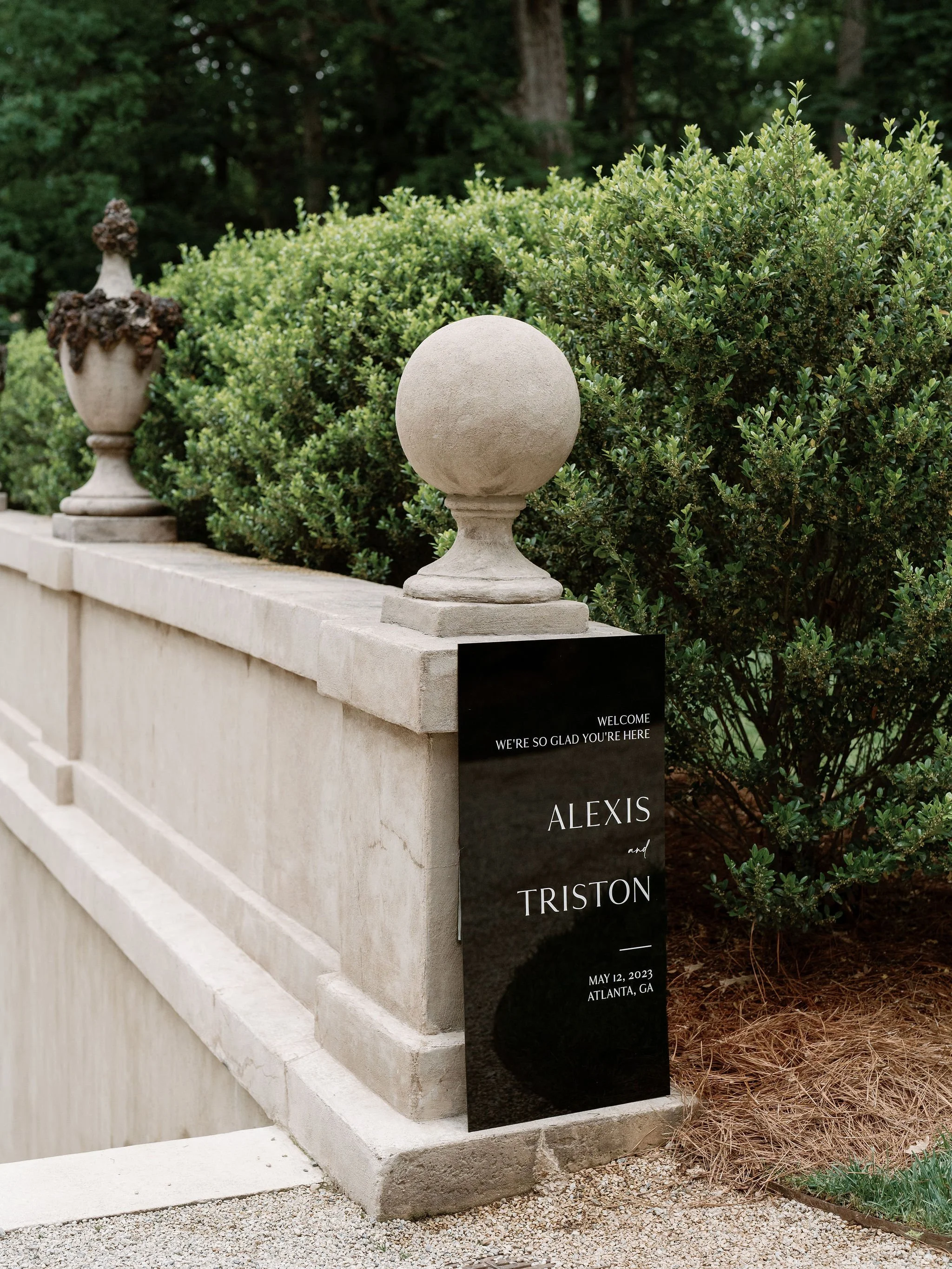 Outdoor wedding ceremony at Swan House Atlanta History Center with elegant garden and estate backdrop