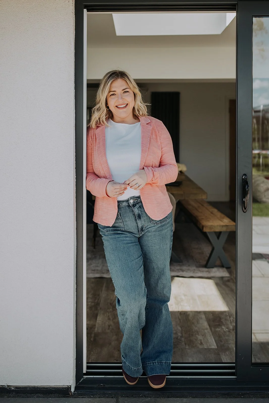 “Laura Cresswell, founder of The Lume Collective, smiling at the camera.