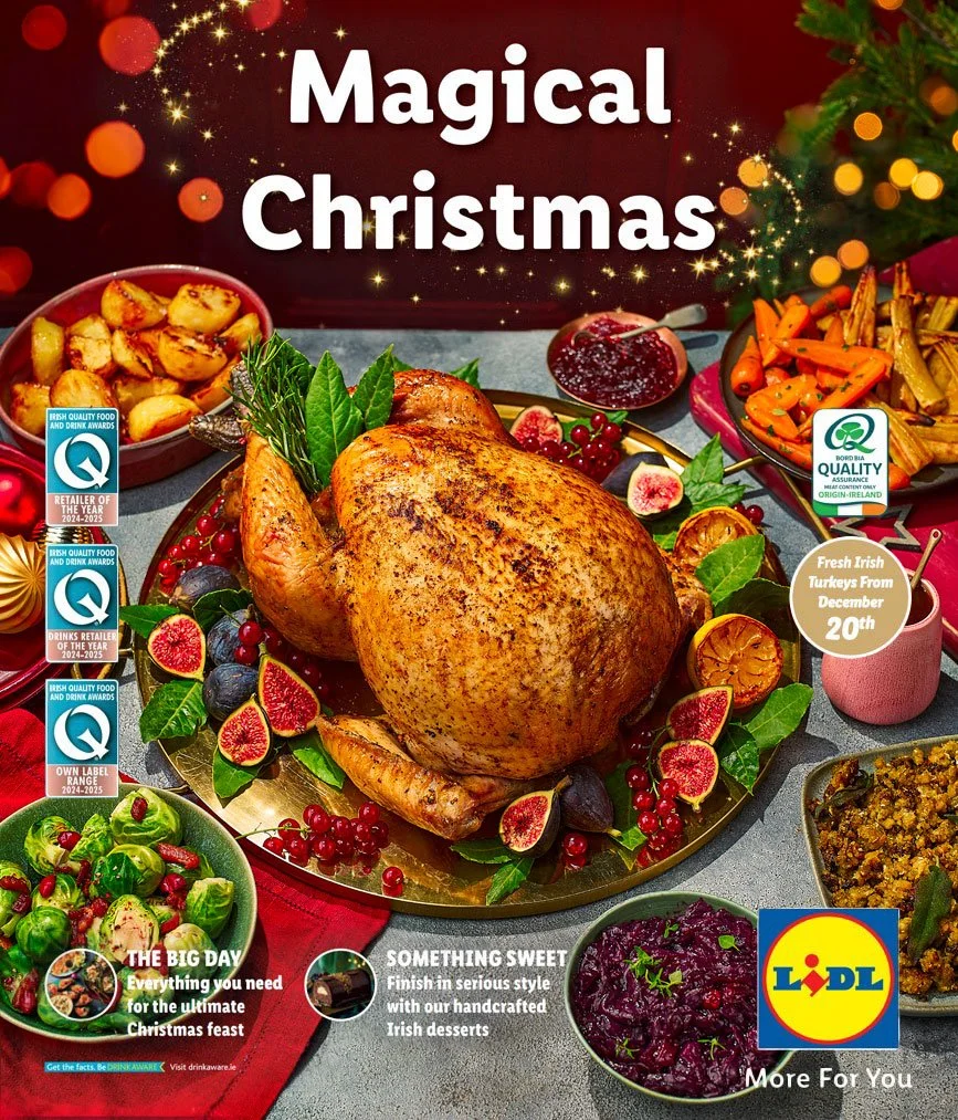 A Christmas feast with a roasted turkey surrounded by various side dishes, including vegetables, stuffing, and cranberry sauce, set on a table decorated for Christmas with a Christmas tree in the background.