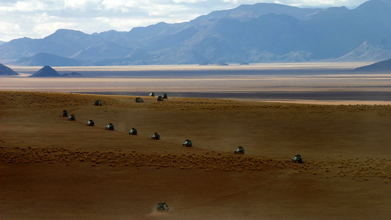 Petronas 4x4 adventure team driving through sand dunes in the Namib Desert