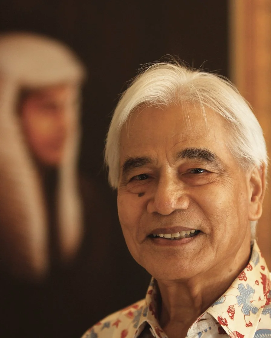 Sultan Azlan Shah photographed in a relaxed setting, looking calmly toward the camera.