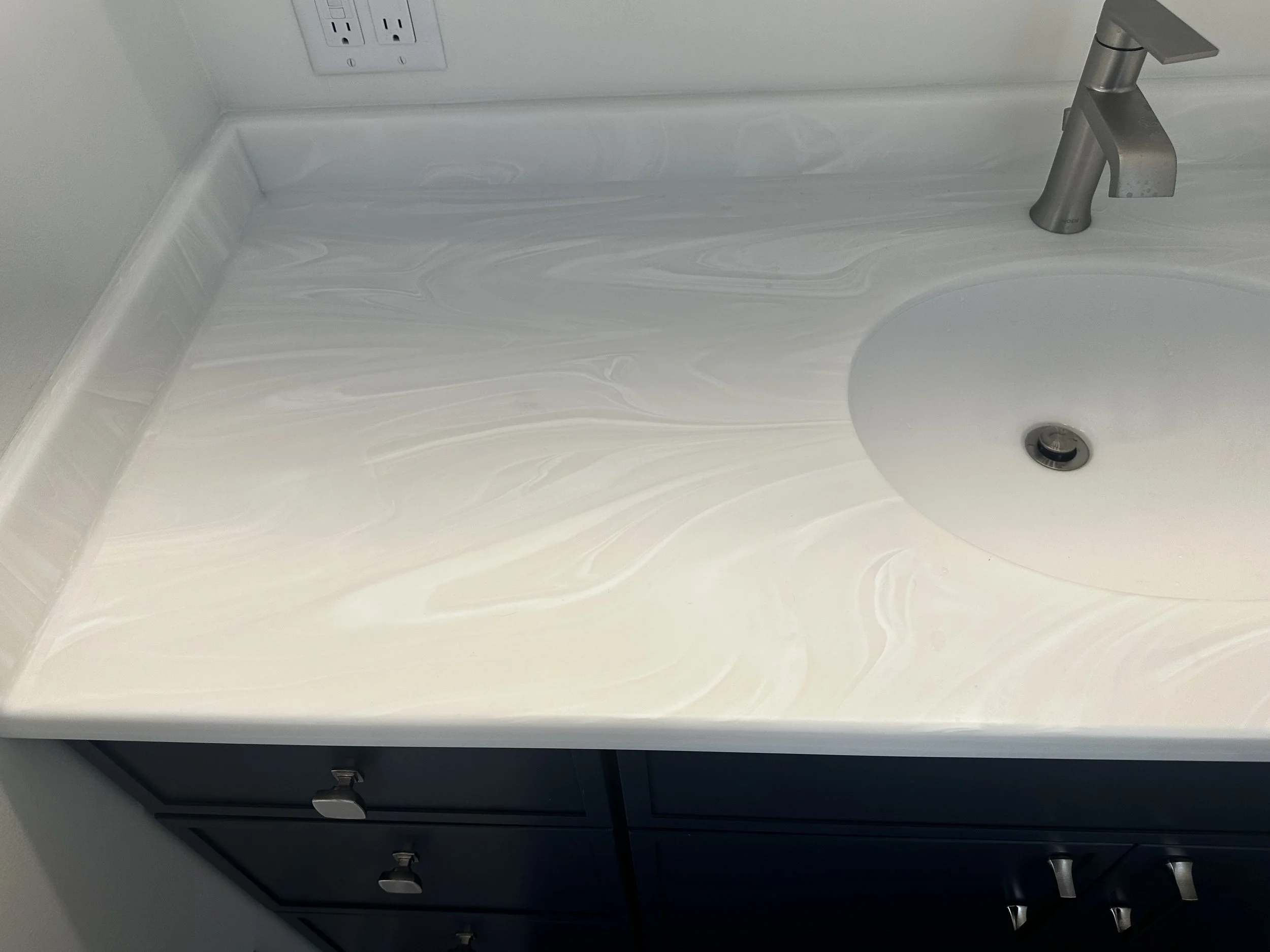 root-down-remodeling-bathroom-corian-white-onyx-countertop.JPG