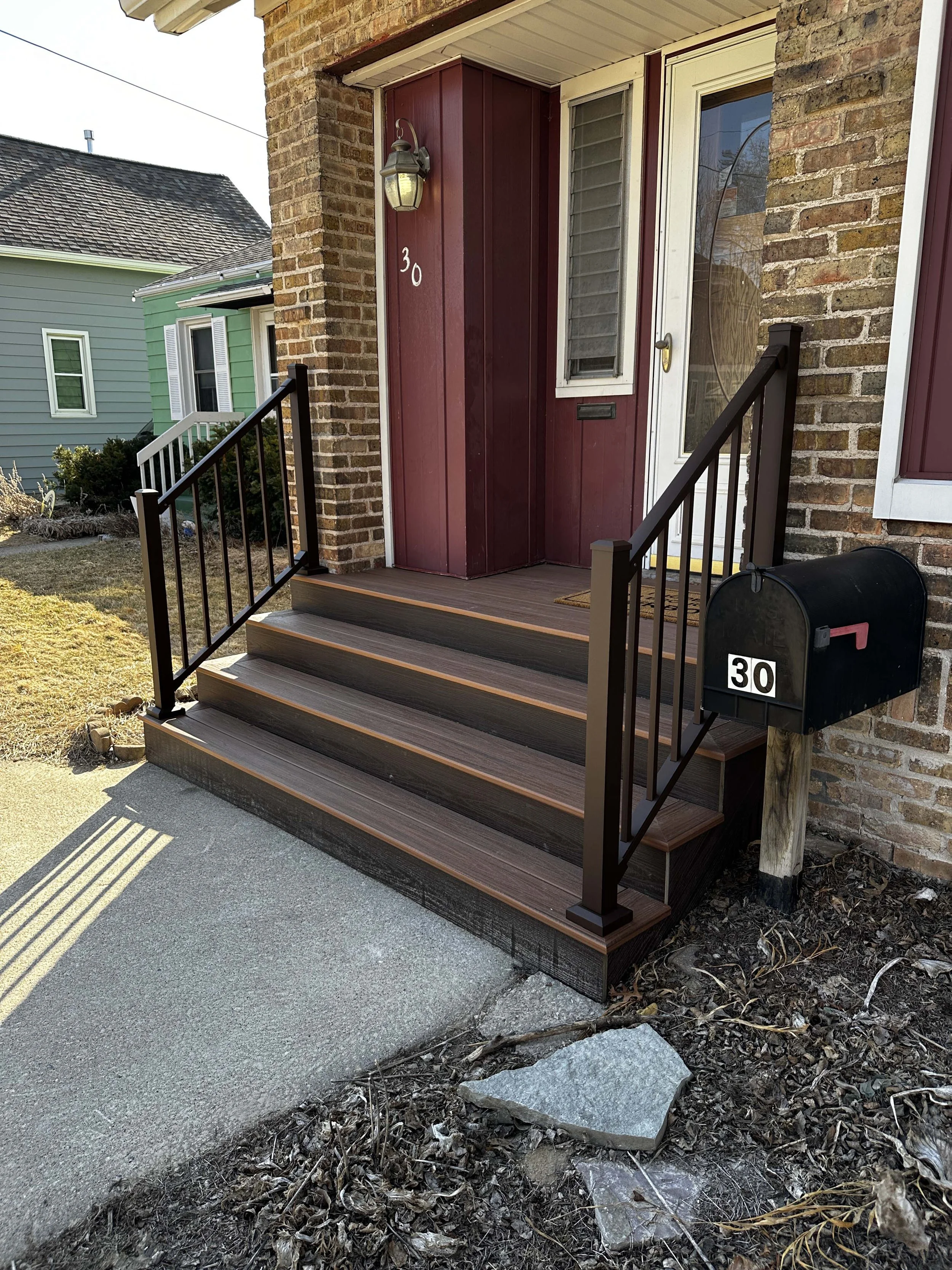 root-down-remodeling-front-porch-stairs-angle.jpg