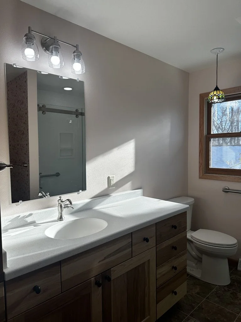 Seamless Corian countertop installation with an integrated backsplash.