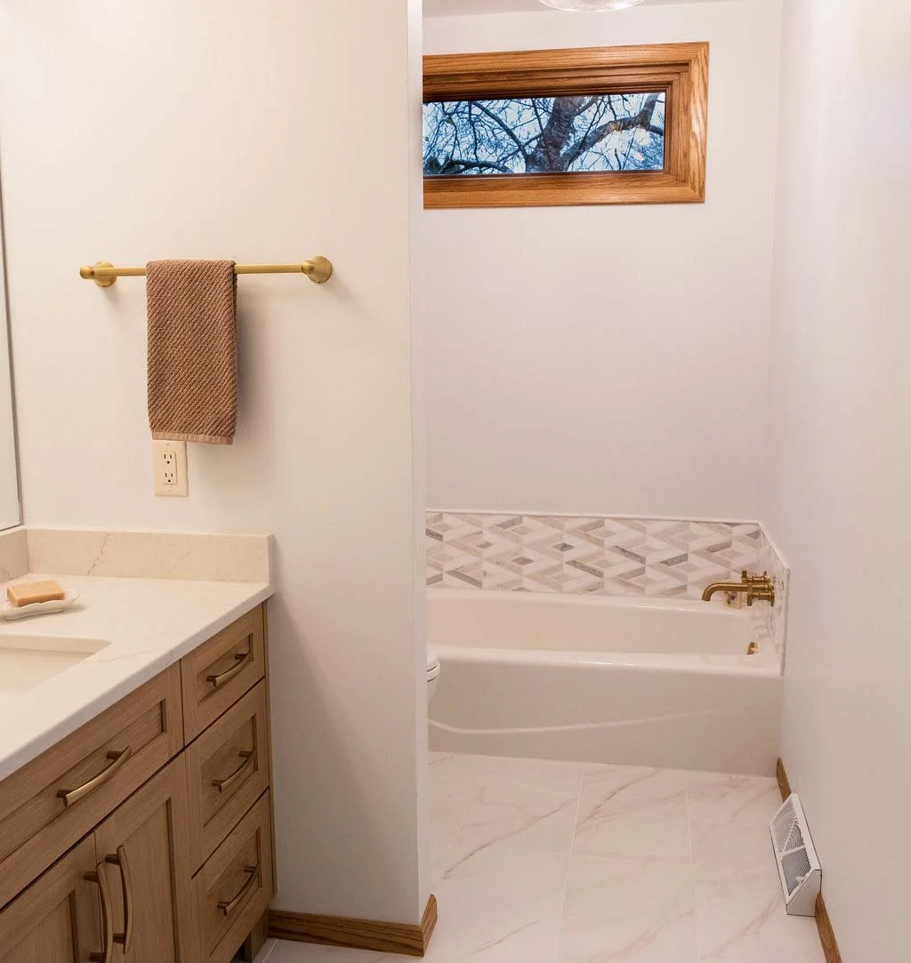 root-down-remodeling-bathroom-remodel-bathtub-with-small-window.jpg