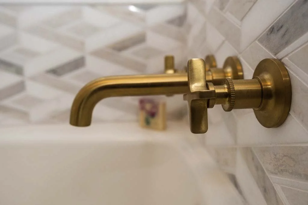 root-down-remodeling-bathroom-remodel-close-up-of-tub-faucet.jpg