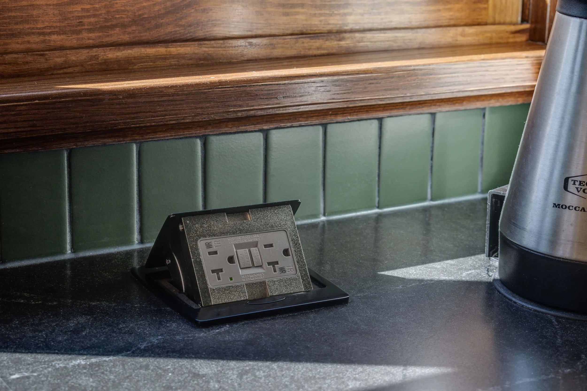 root-down-remodeling-kitchen-hidden-outlet-tile-custom-millwork.jpg
