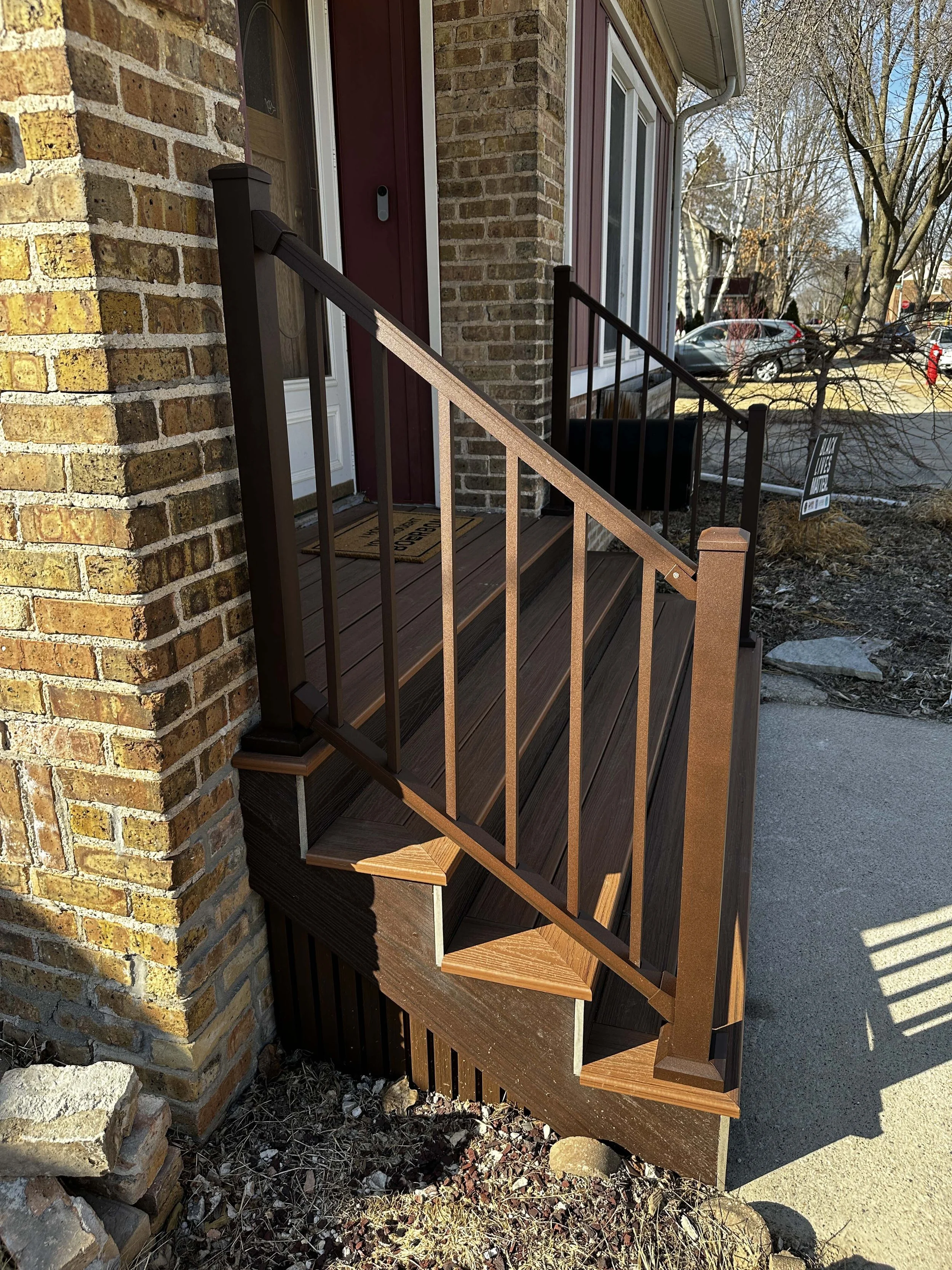 root-down-remodeling-front-porch-stairs-and-railing-side.jpg