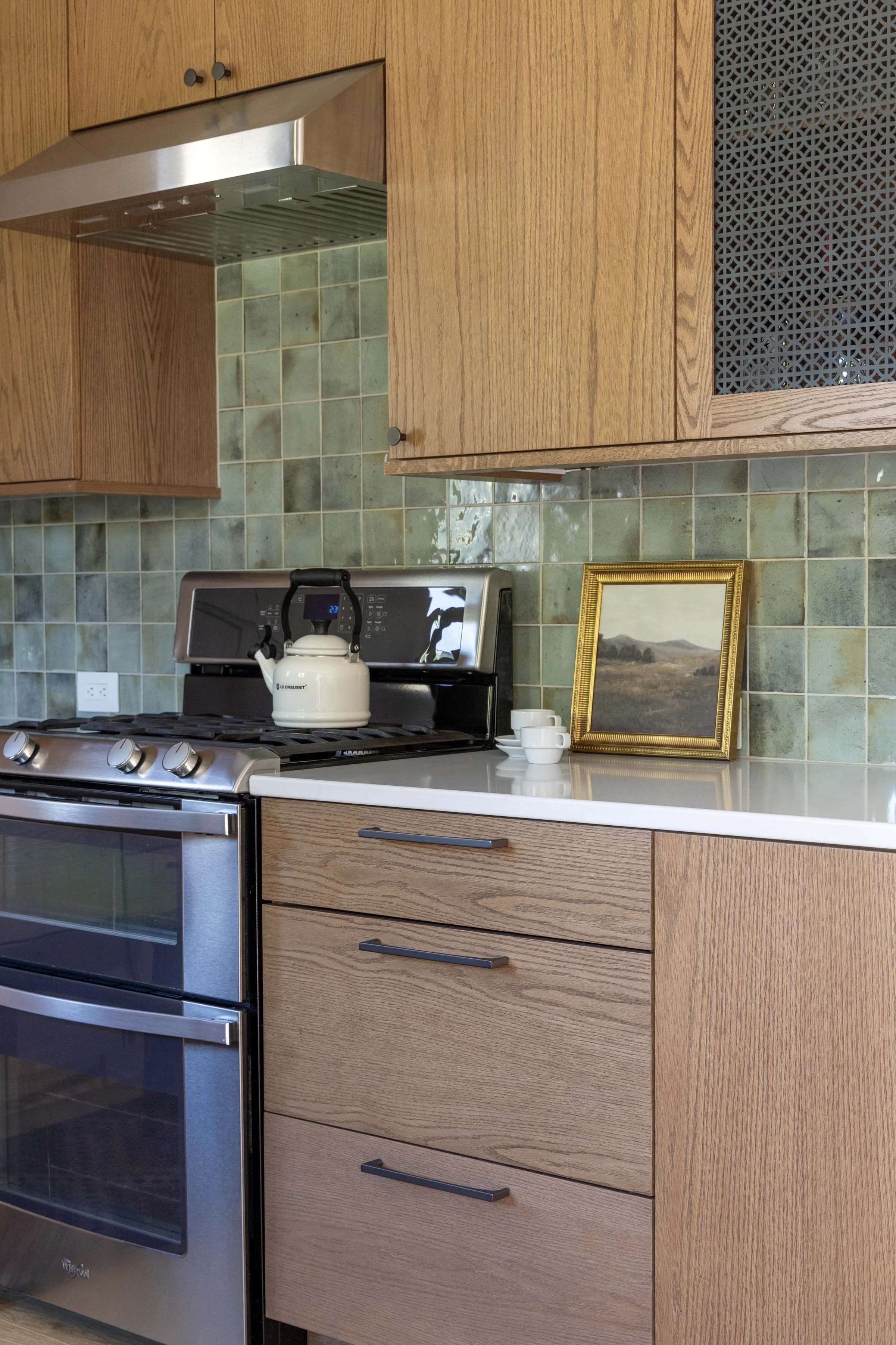 root-down-remodeling-kitchen-rangehood-cabinetry.jpg