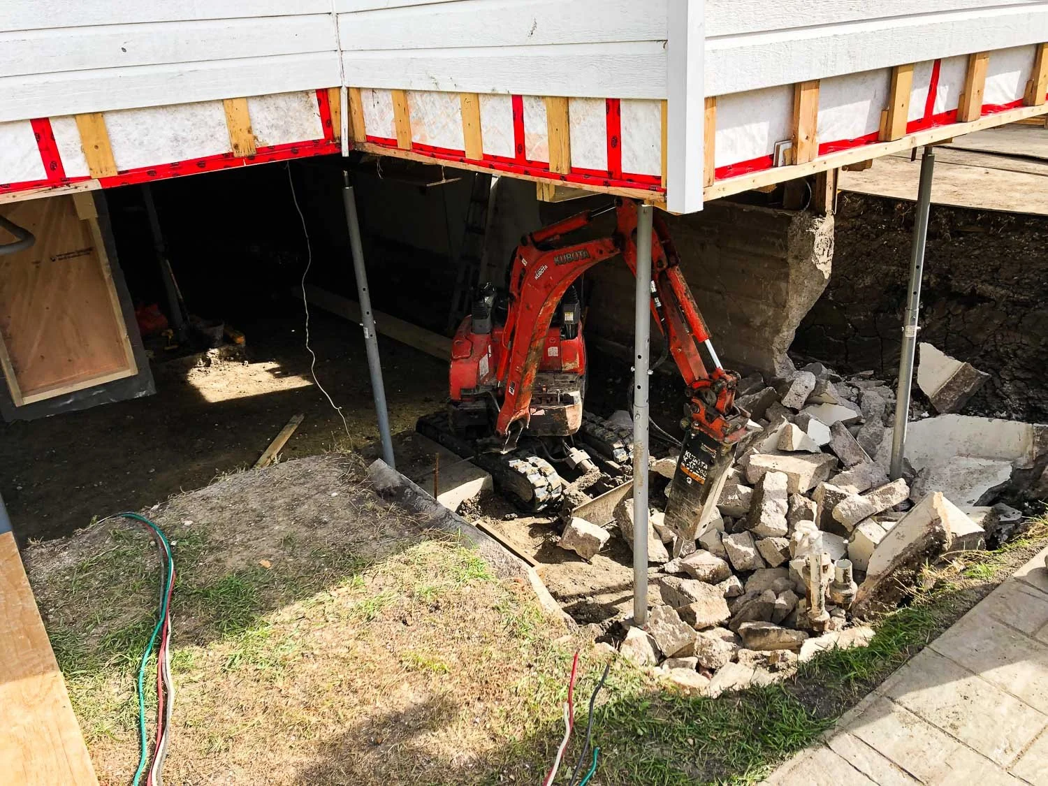 In progress construction of foundation replacement.