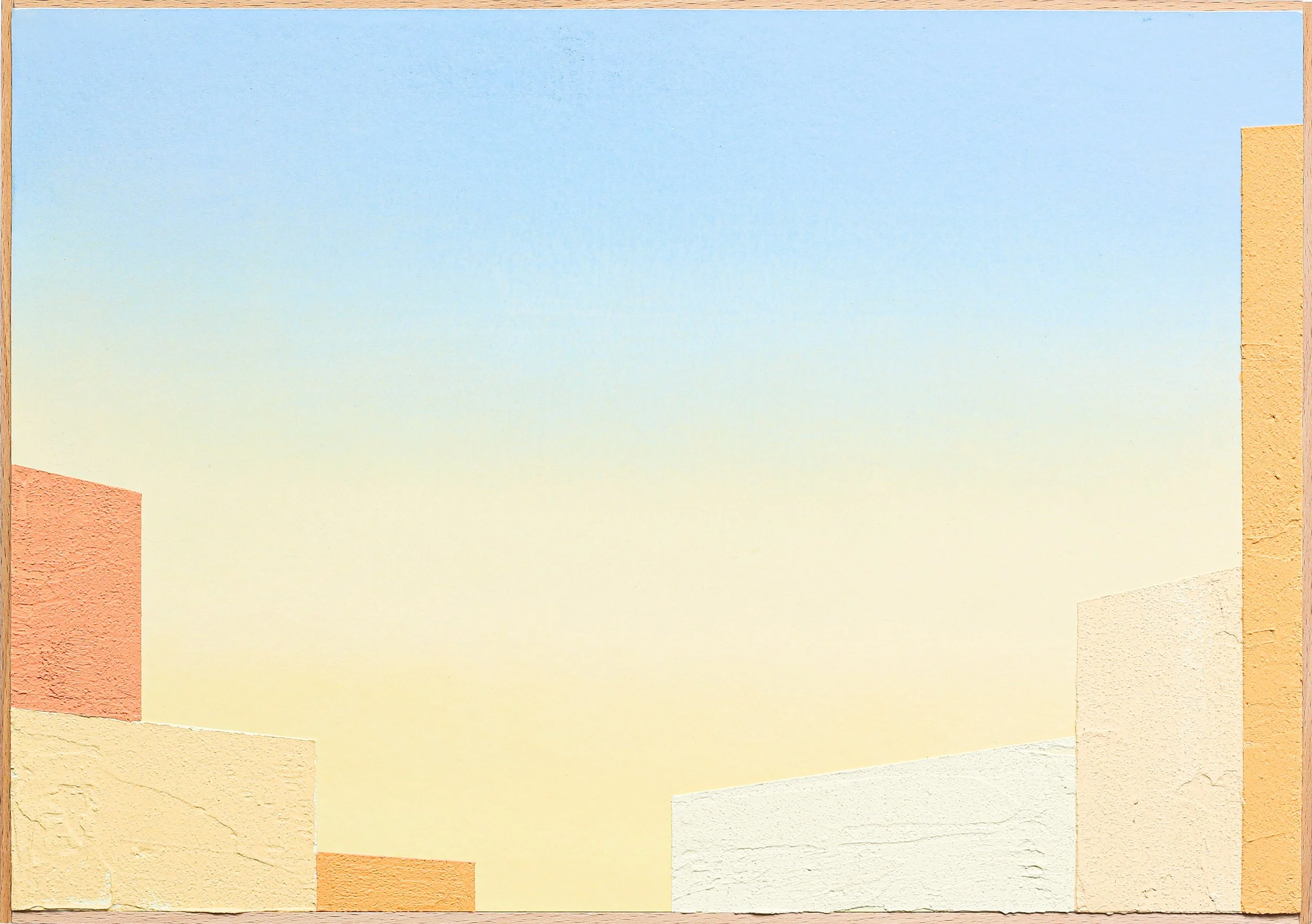 Abstract pastel-colored building walls with a clear sky background.