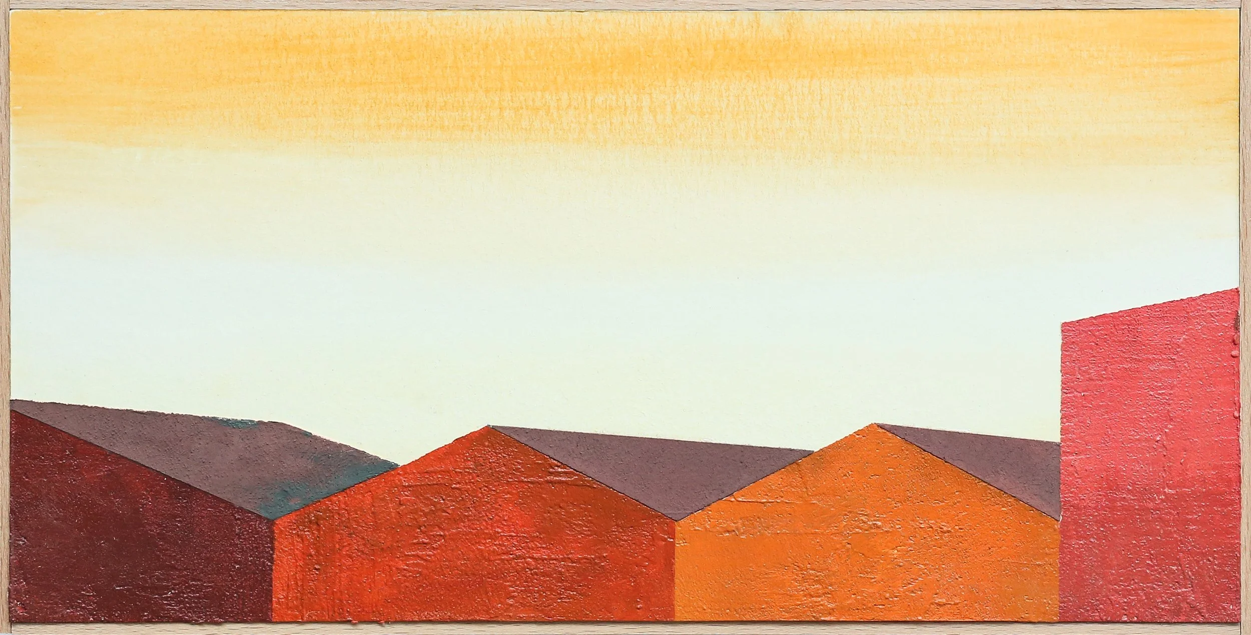 Abstract painting depicting a row of colorful, geometric houses with textured surfaces and sloped roofs under a gradient sky transitioning from orange to light yellow.
